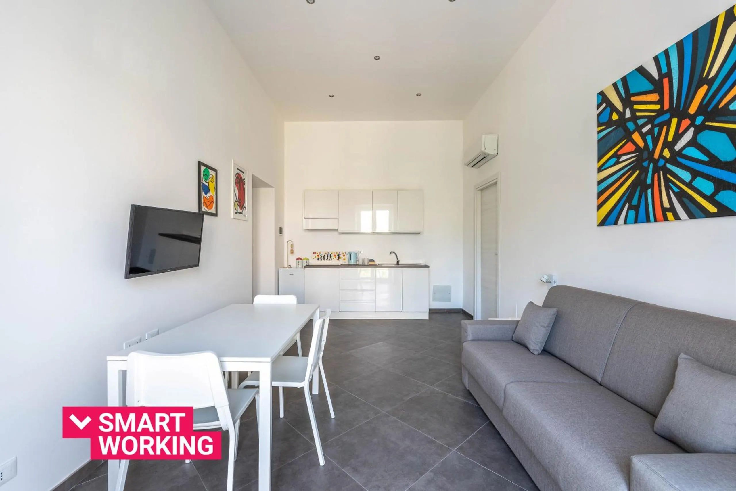 Kitchen or kitchenette in Apartments La Cala by Wonderful Italy