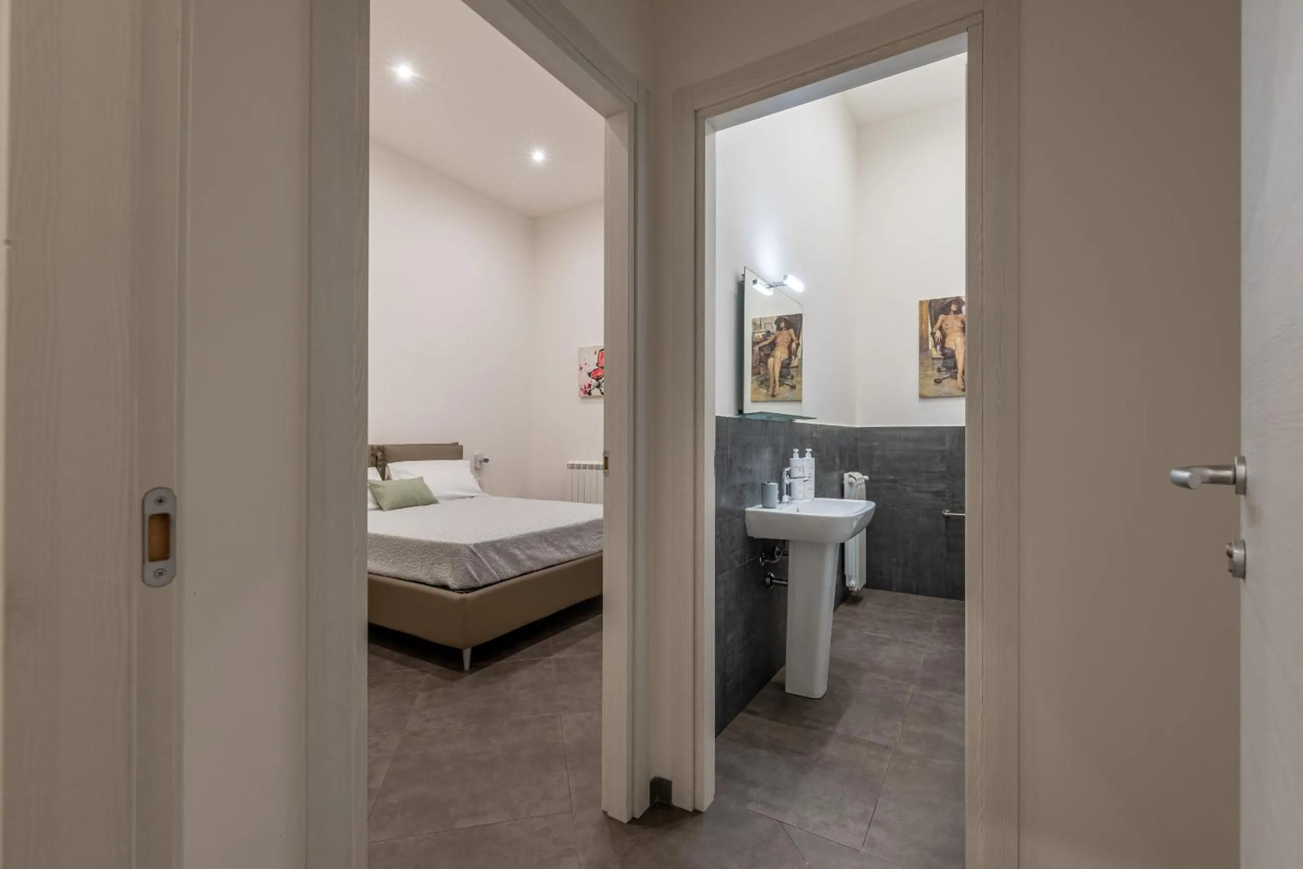 Bed in Apartments La Cala by Wonderful Italy