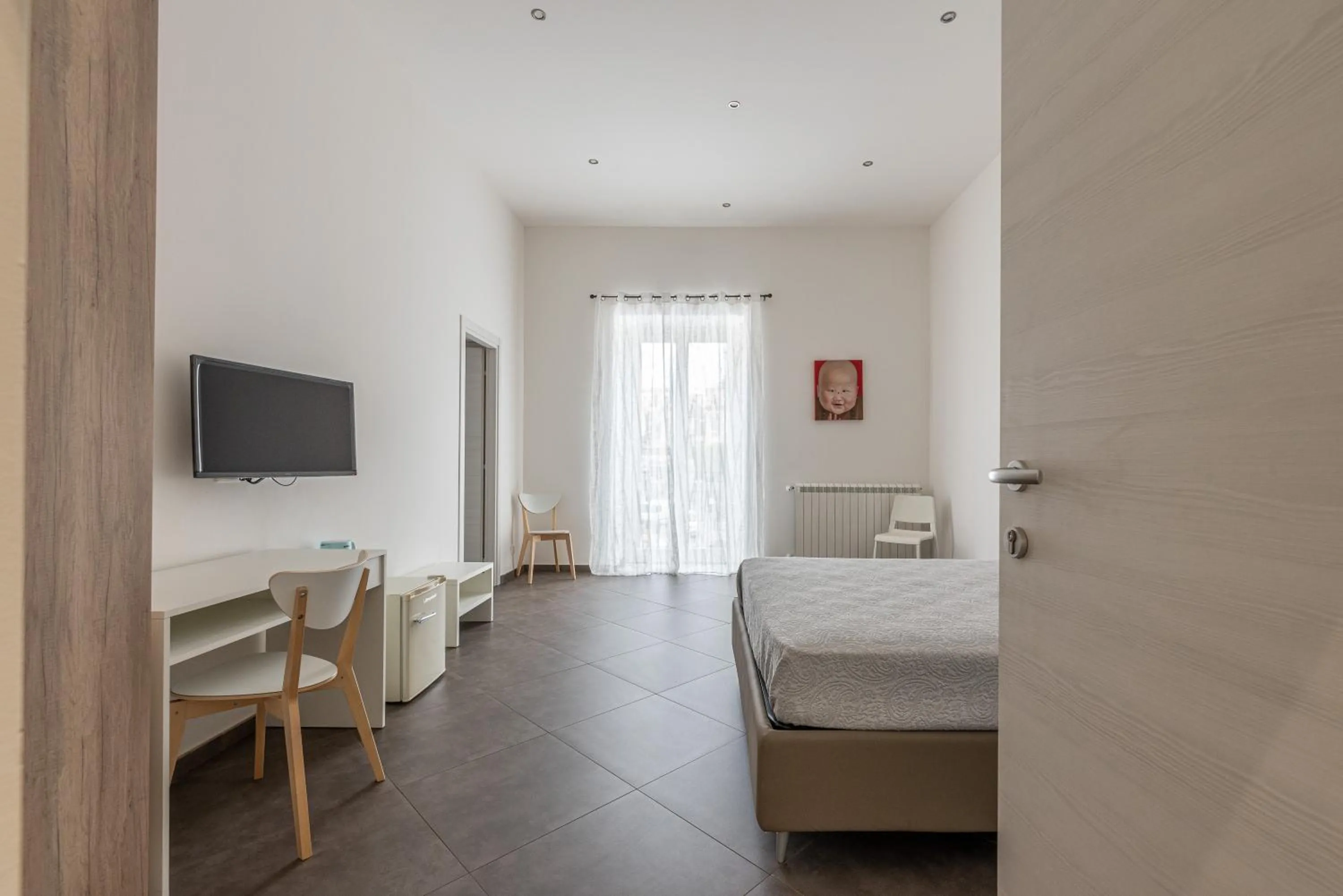 Bedroom, Bed in Apartments La Cala by Wonderful Italy