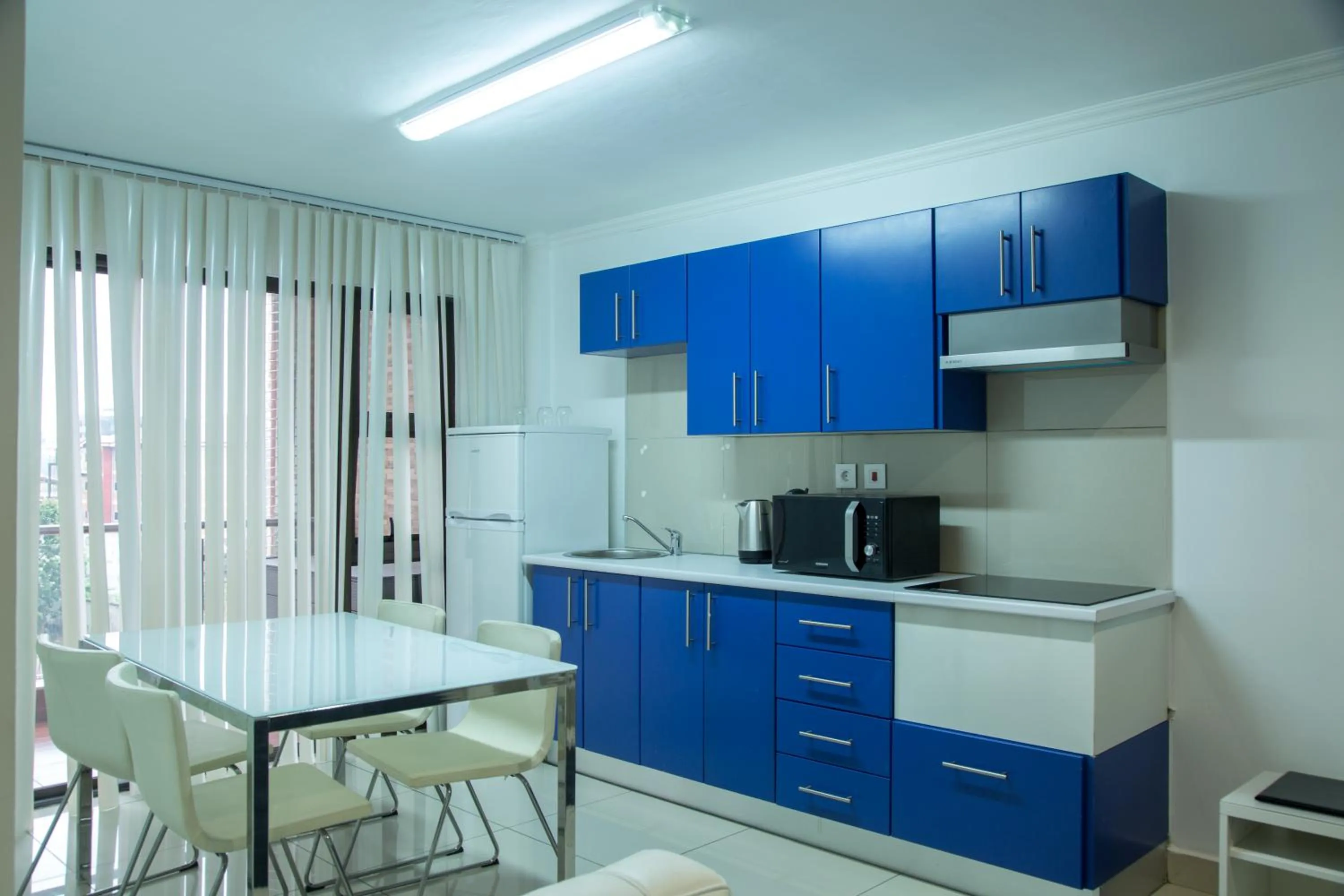Kitchen or kitchenette in WDC APARTHOTEL - BUEA
