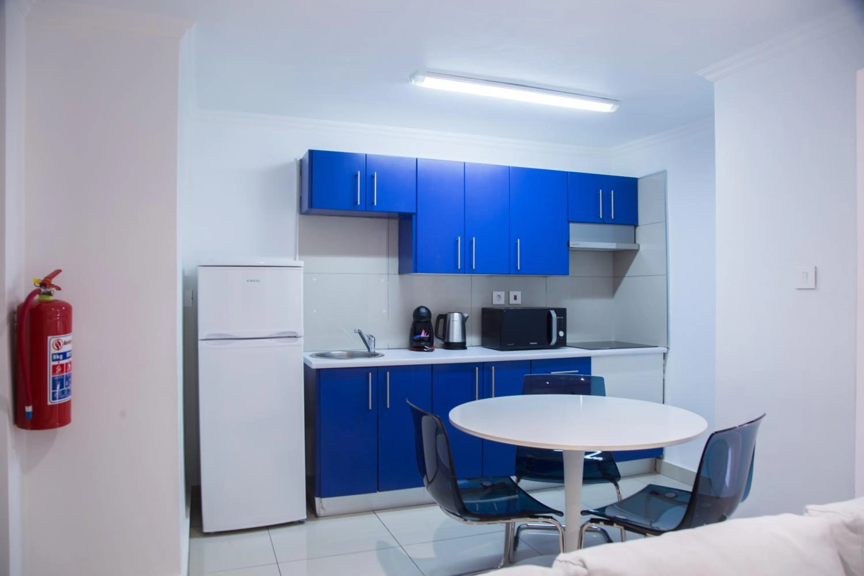 Kitchen or kitchenette in WDC APARTHOTEL - BUEA