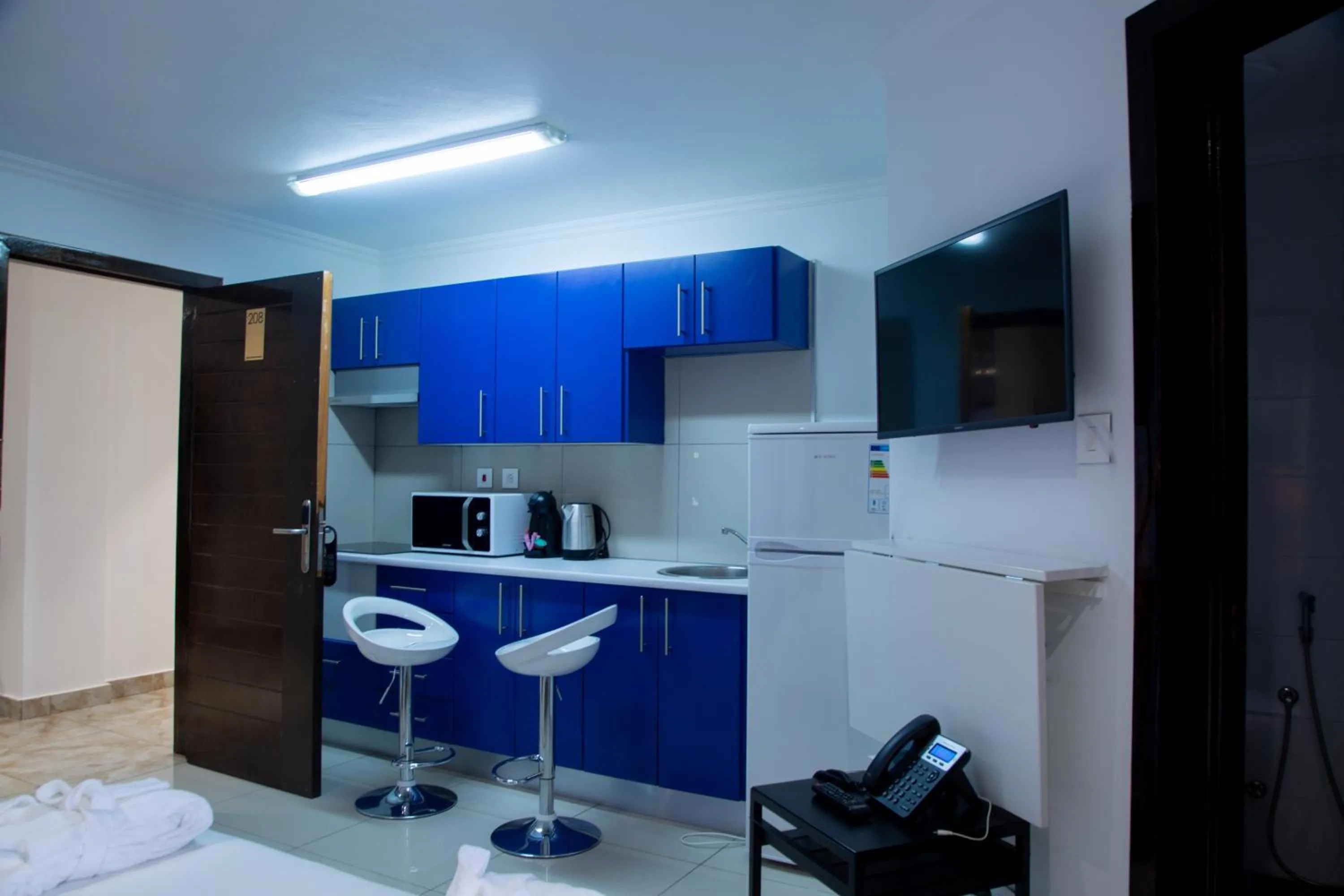 Kitchen or kitchenette in WDC APARTHOTEL - BUEA