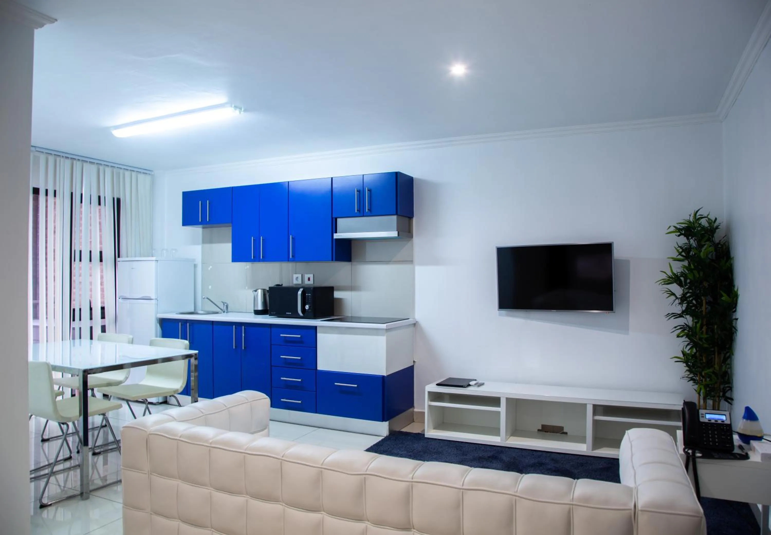 Kitchen or kitchenette in WDC APARTHOTEL - BUEA