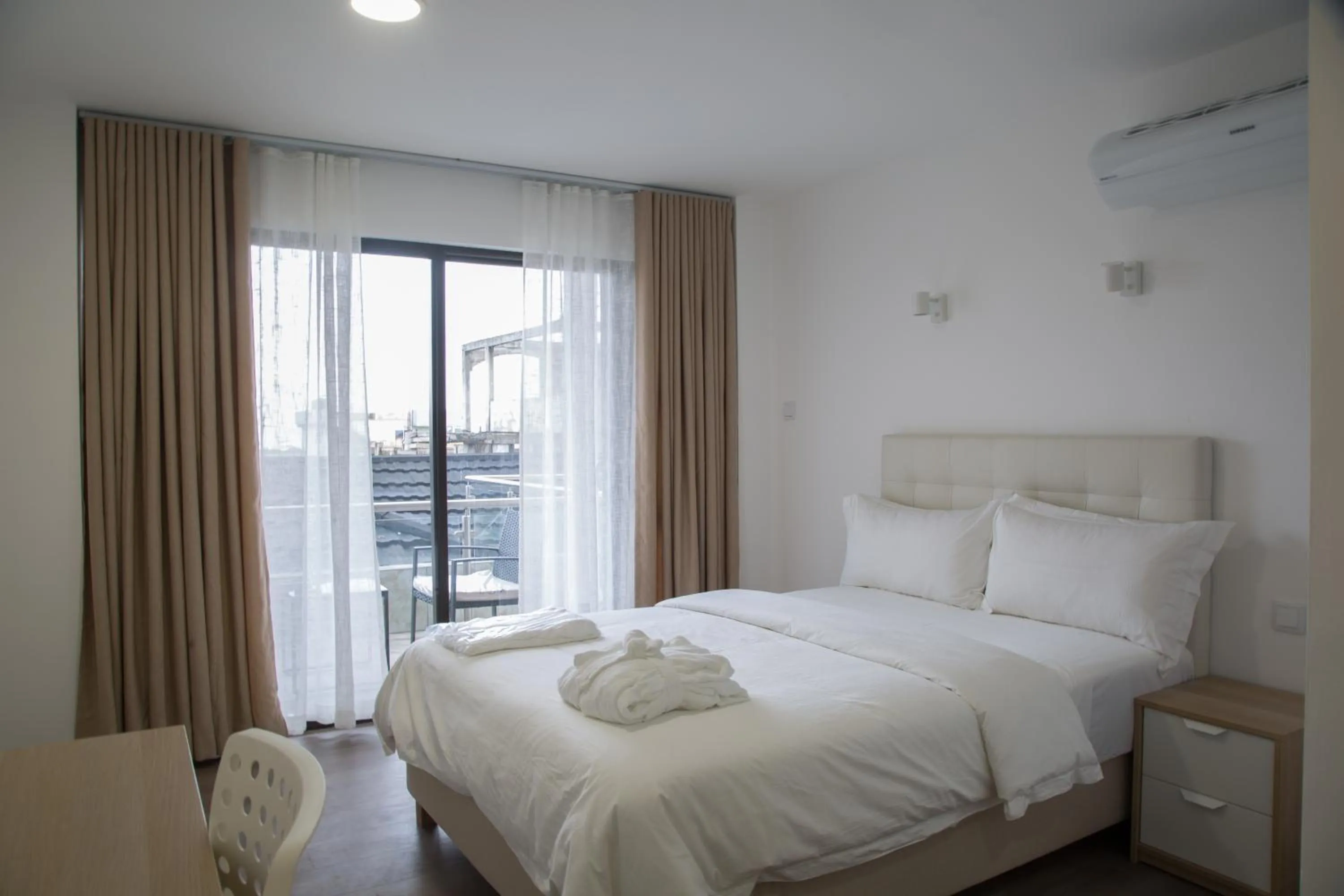 Bedroom, Bed in WDC APARTHOTEL - BUEA