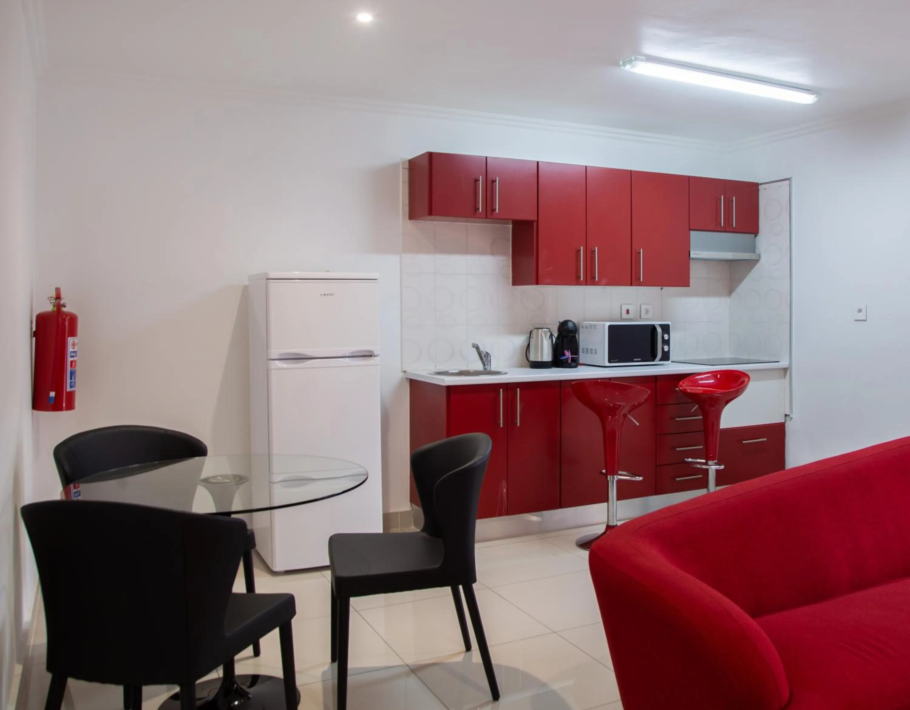 Kitchen or kitchenette in WDC APARTHOTEL - BUEA