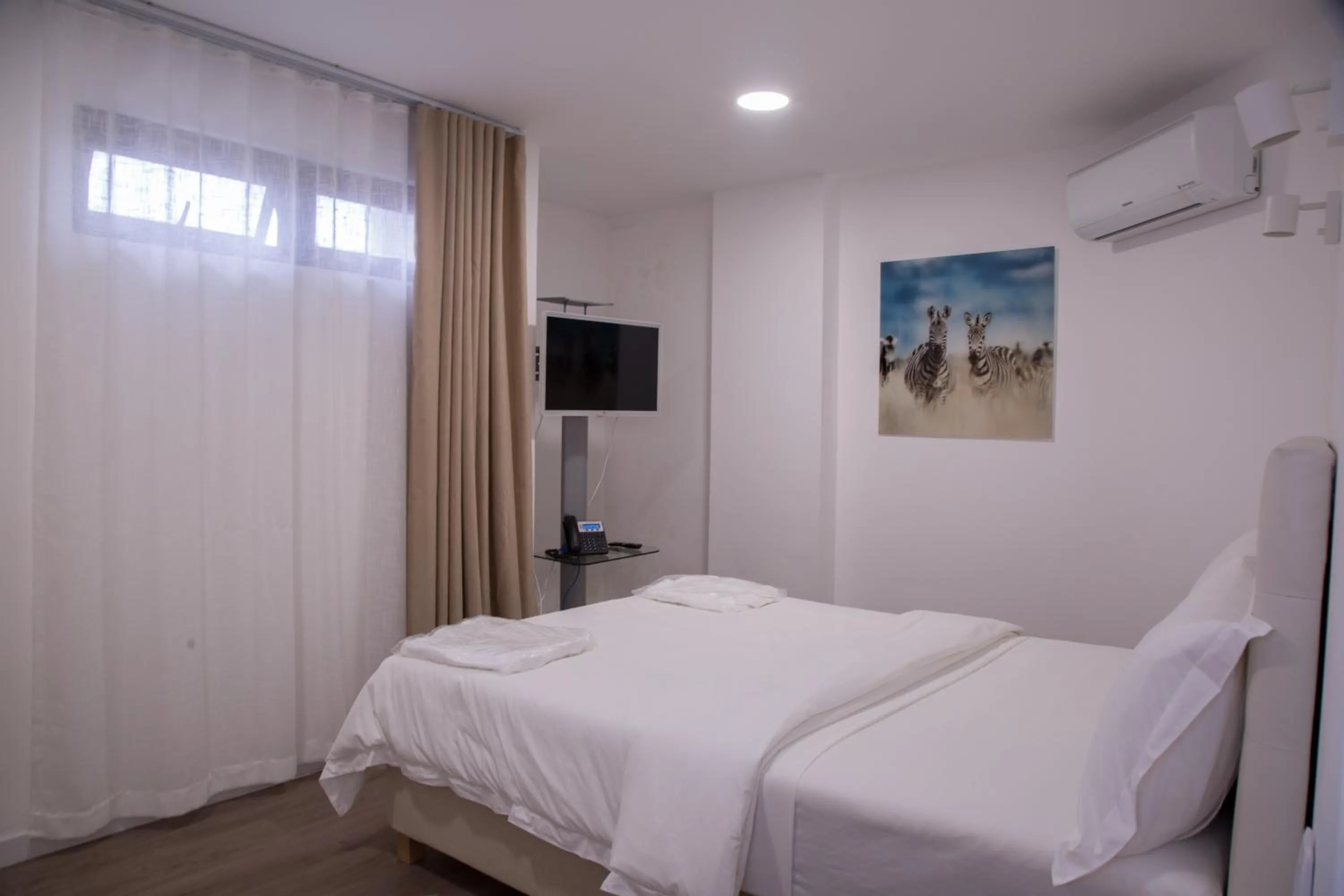 Bedroom, Bed in WDC APARTHOTEL - BUEA