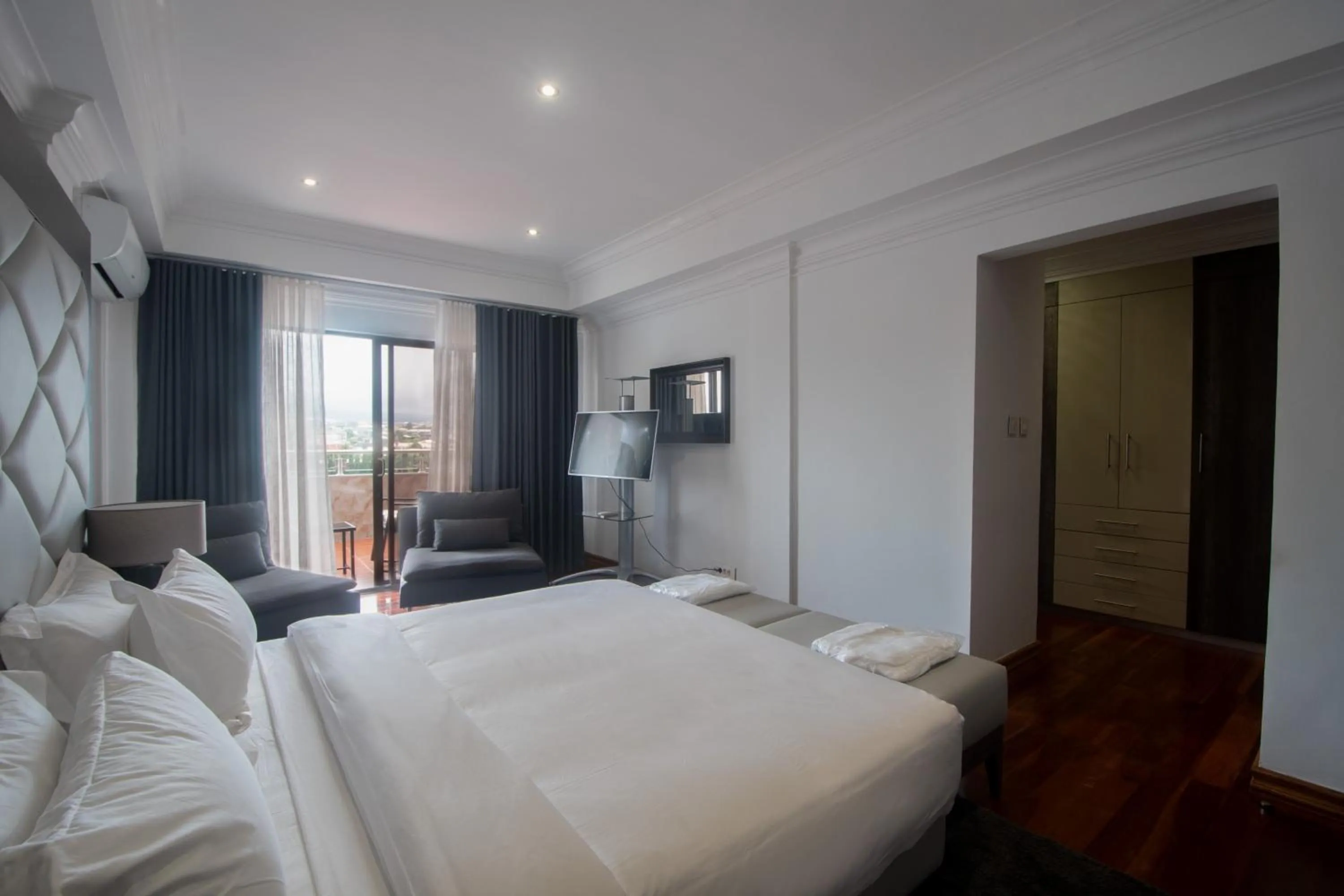 Bedroom, Bed in WDC APARTHOTEL - BUEA