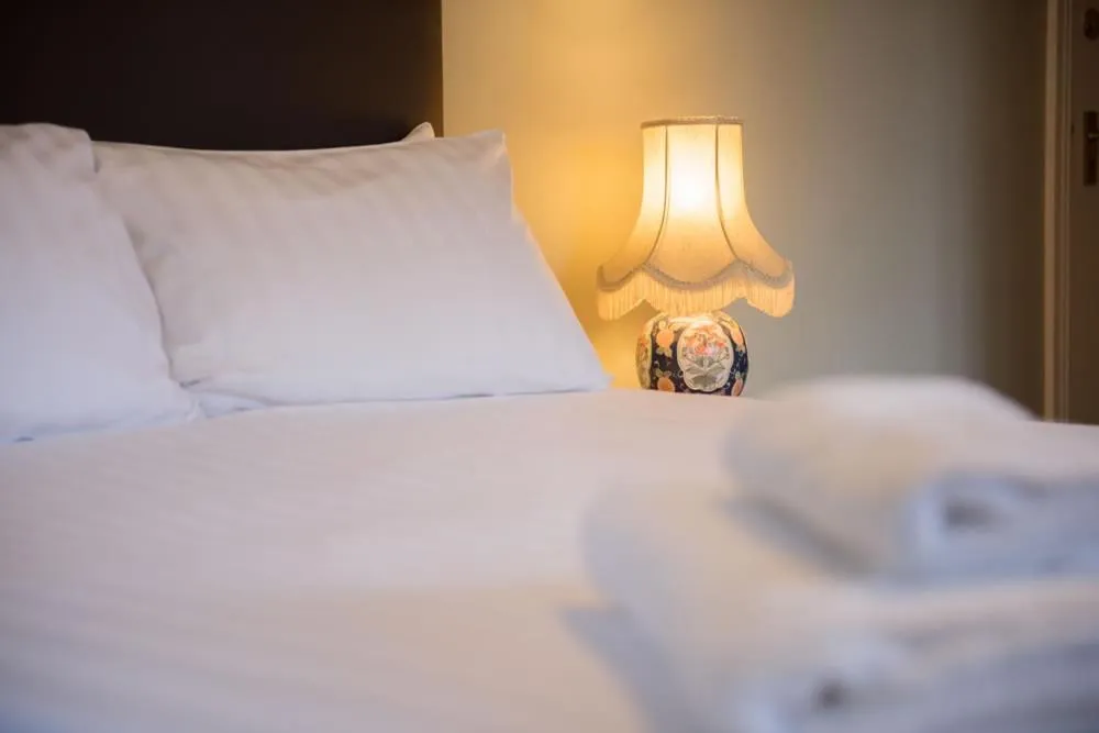 Bed in The Burley Inn