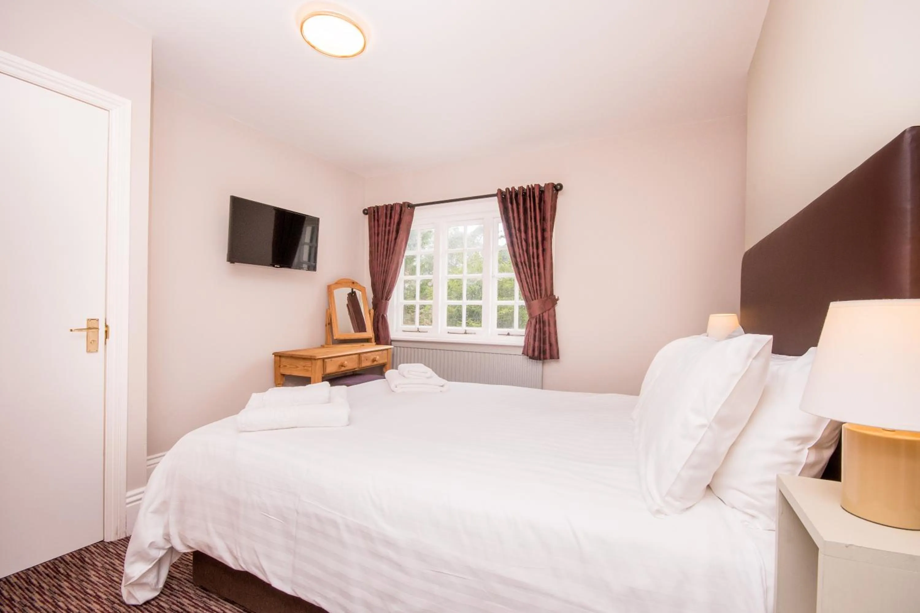 Bed in The Burley Inn