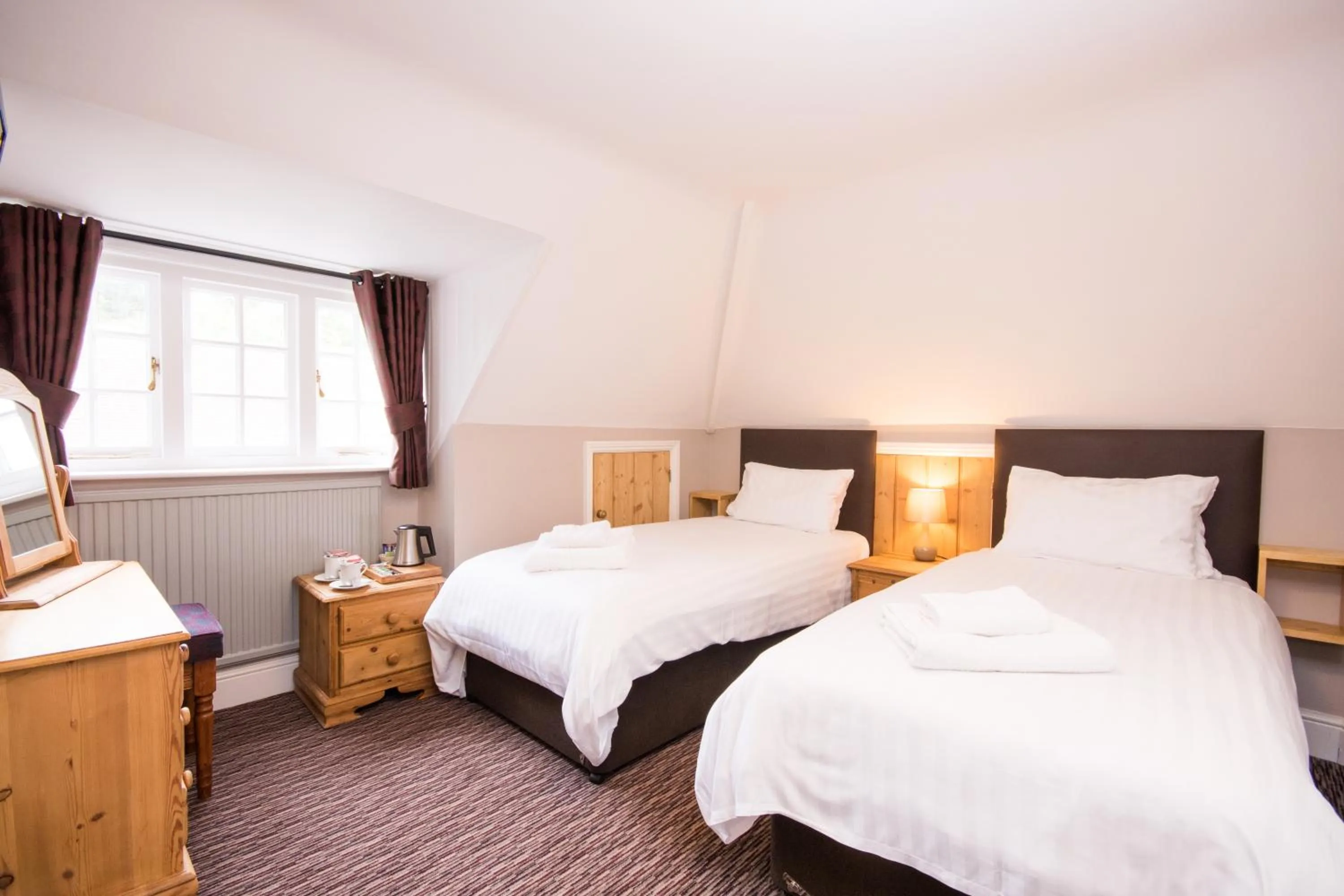 Bed in The Burley Inn