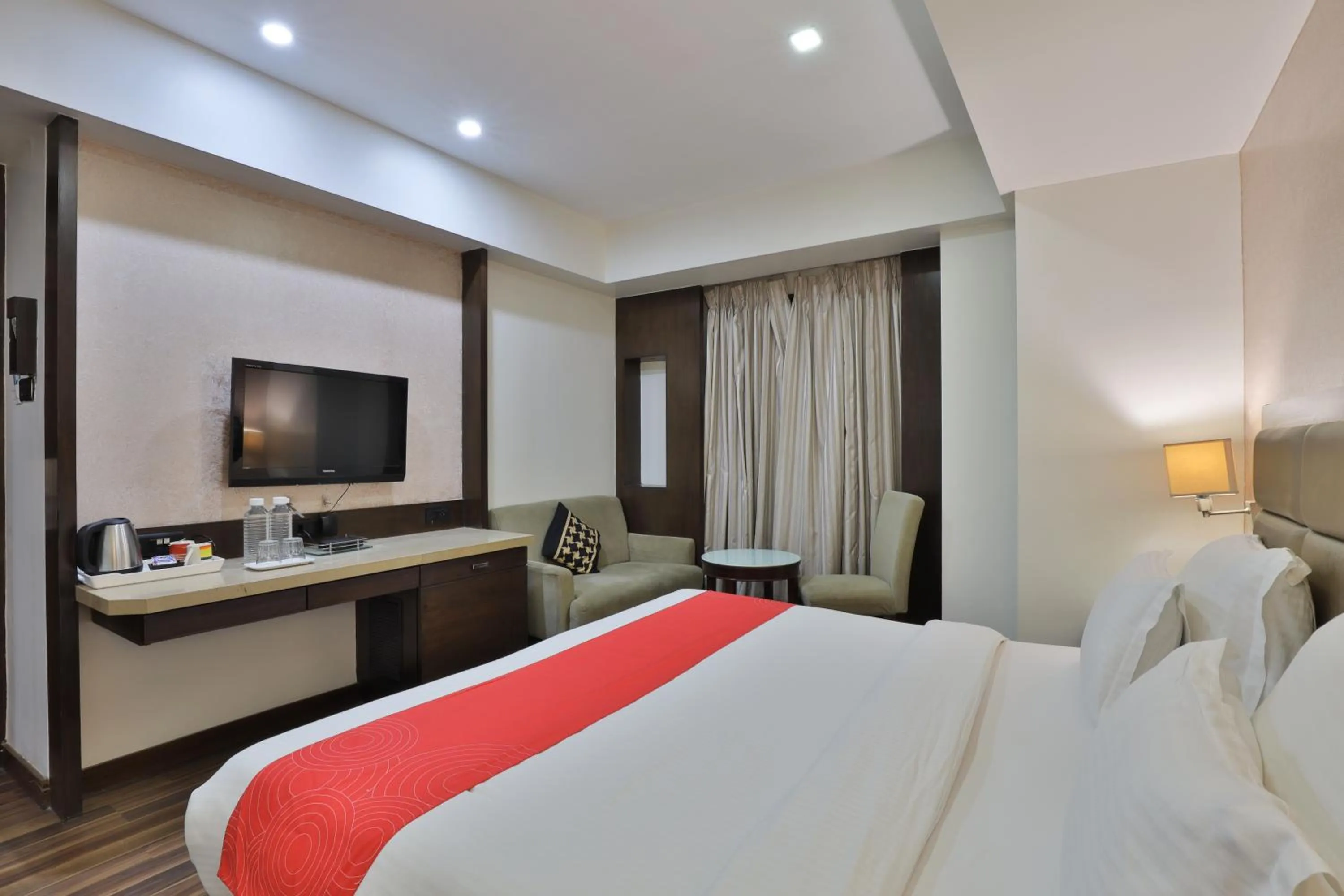 Bedroom, Bed in Krios Hotel - Near SG Highway, Ahmedabad