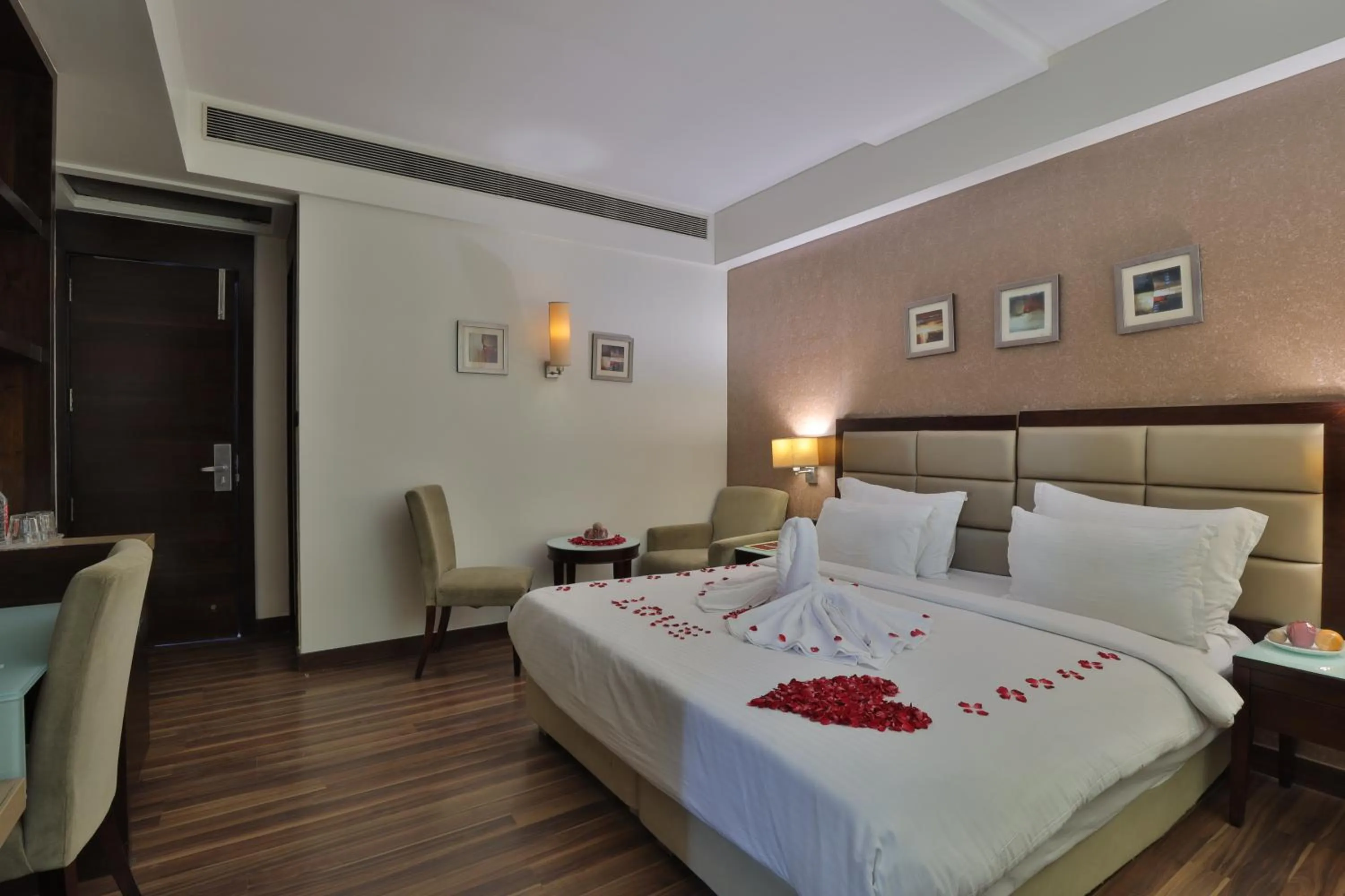 Dining area, Bed in Krios Hotel - Near SG Highway, Ahmedabad