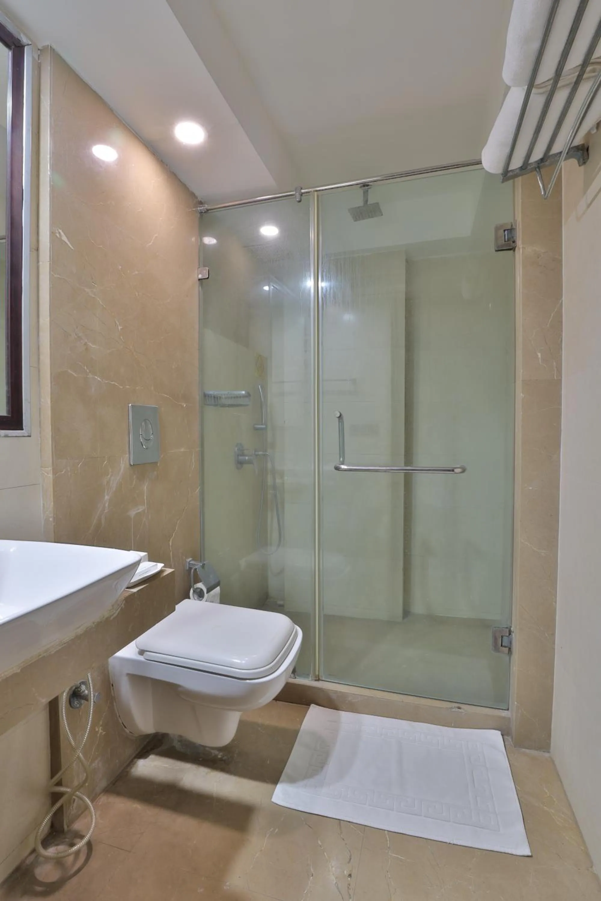 Bathroom in Krios Hotel - Near SG Highway, Ahmedabad