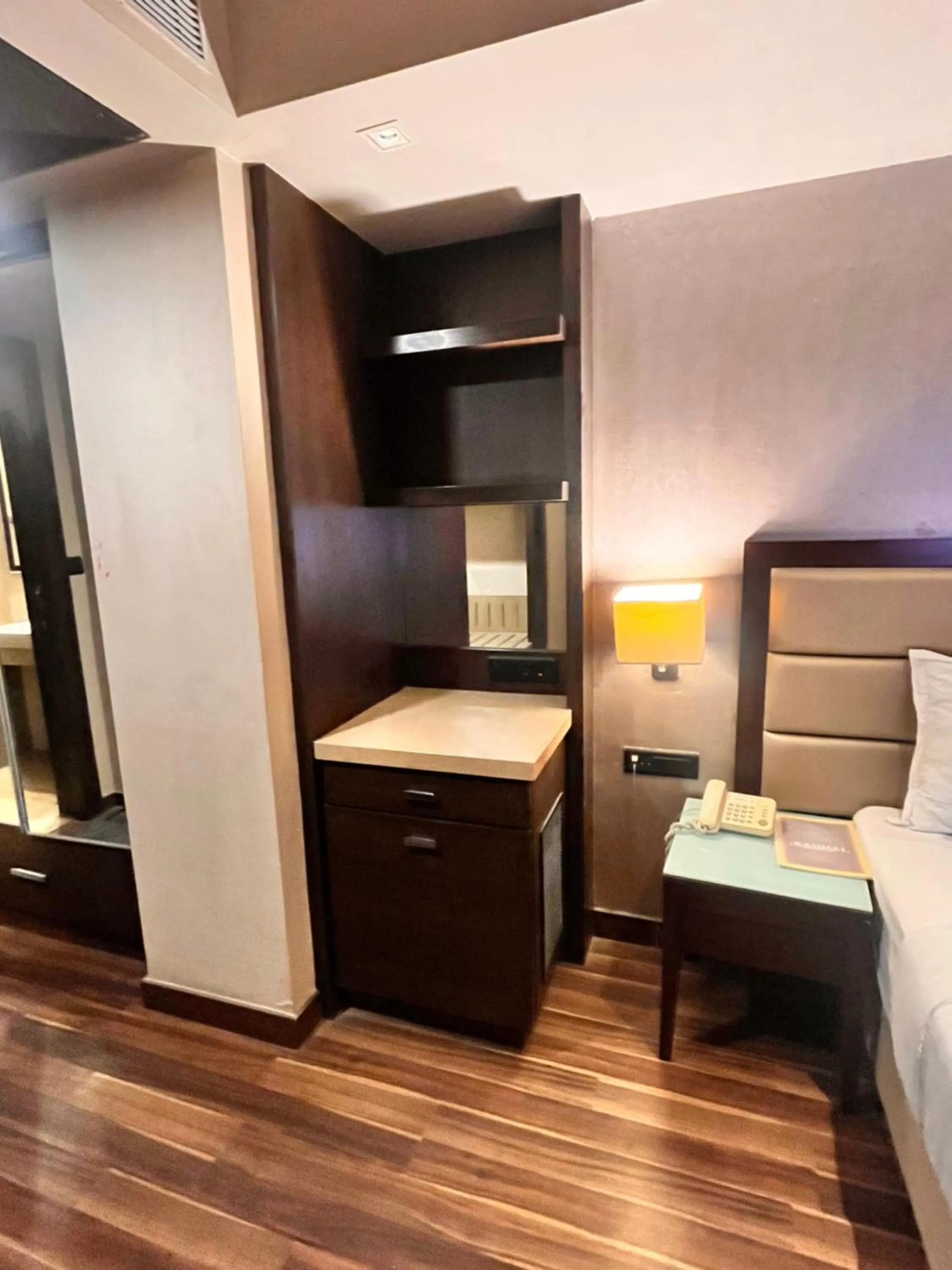 Living room, Bed in Krios Hotel - Near SG Highway, Ahmedabad