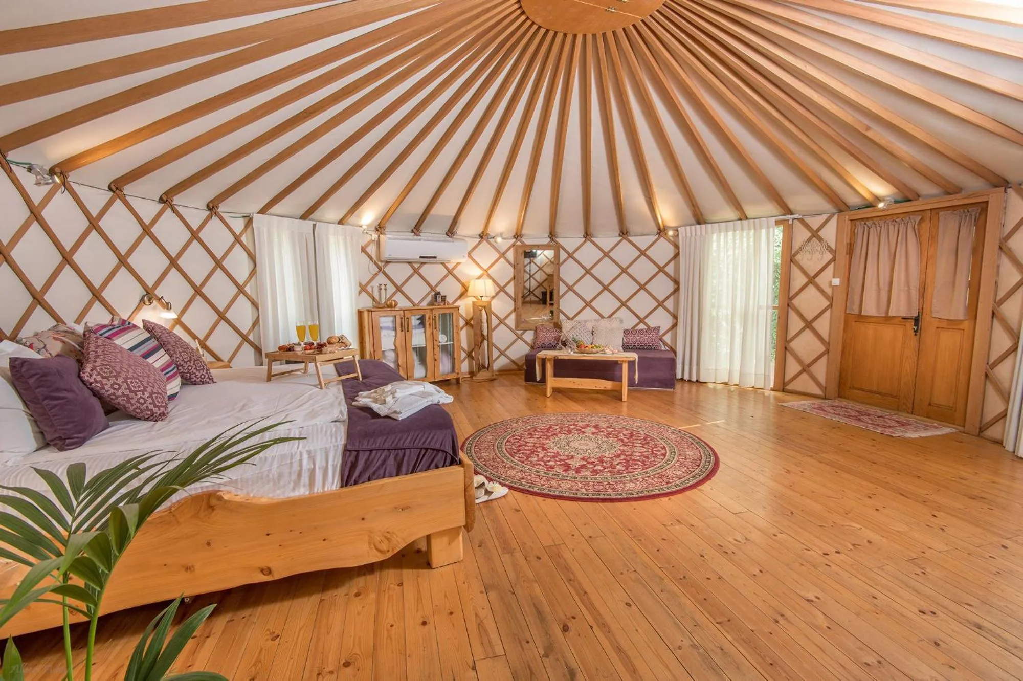 Living room, Bed in Helios Luxury Suites