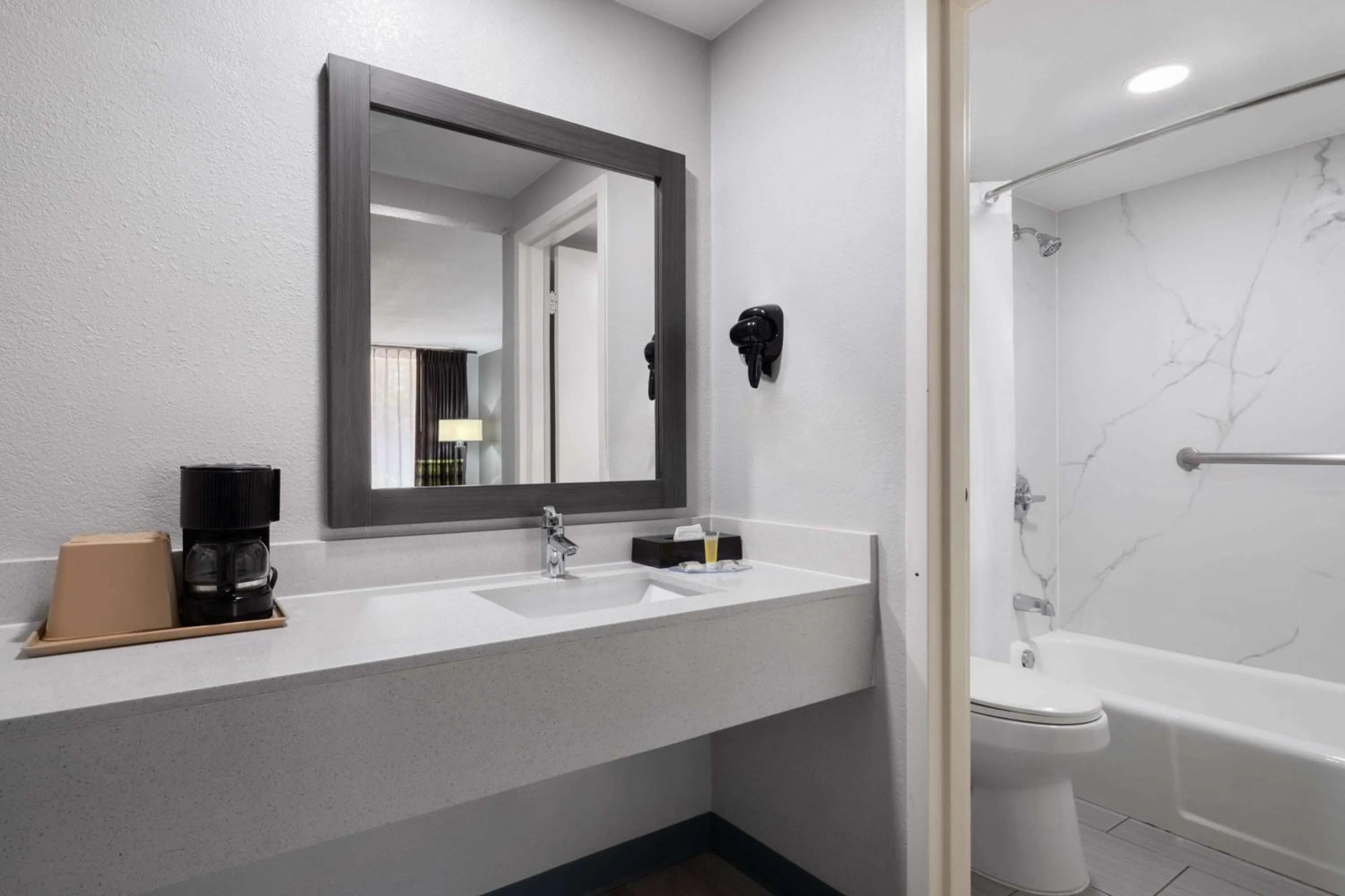 Bathroom in Super 8 by Wyndham Longview/North