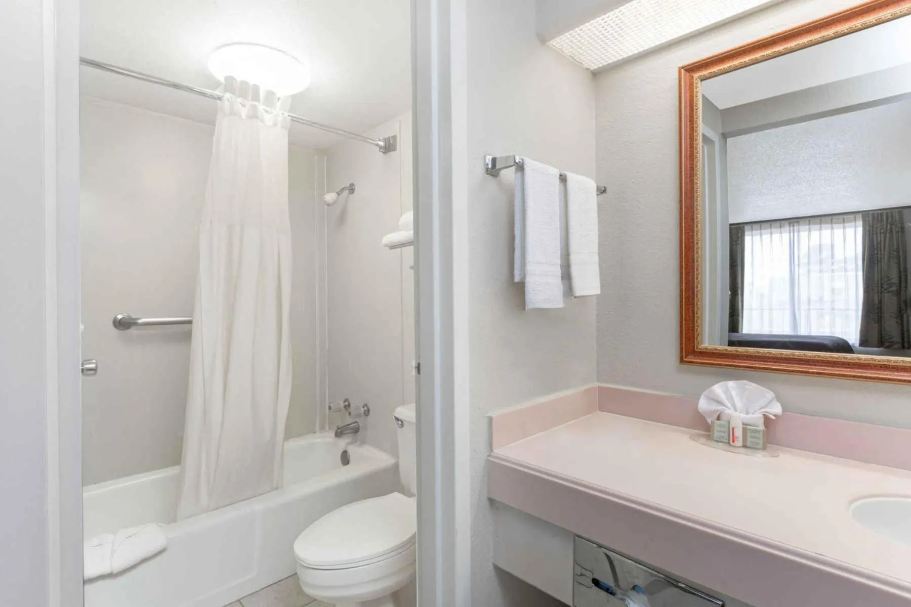 Bathroom in Super 8 by Wyndham Longview/North