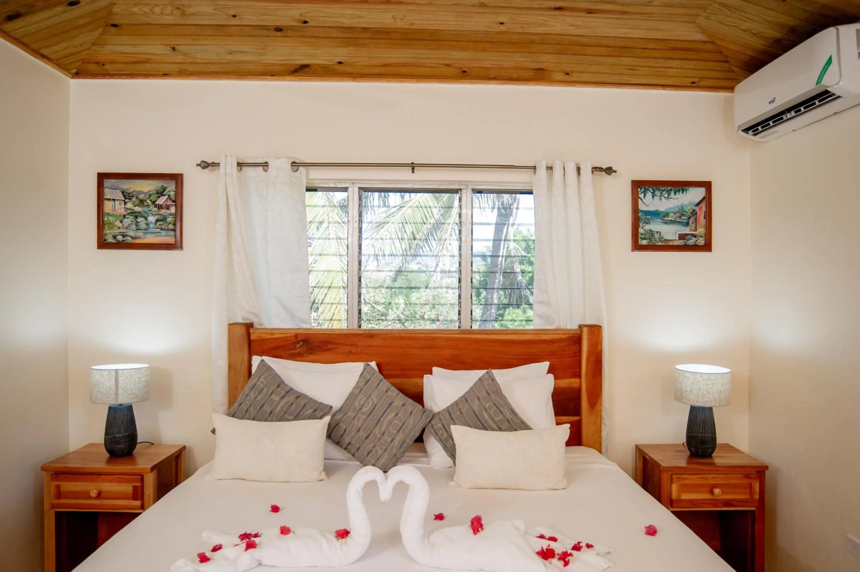 Bed in Beyond Sunset Resort & Villas