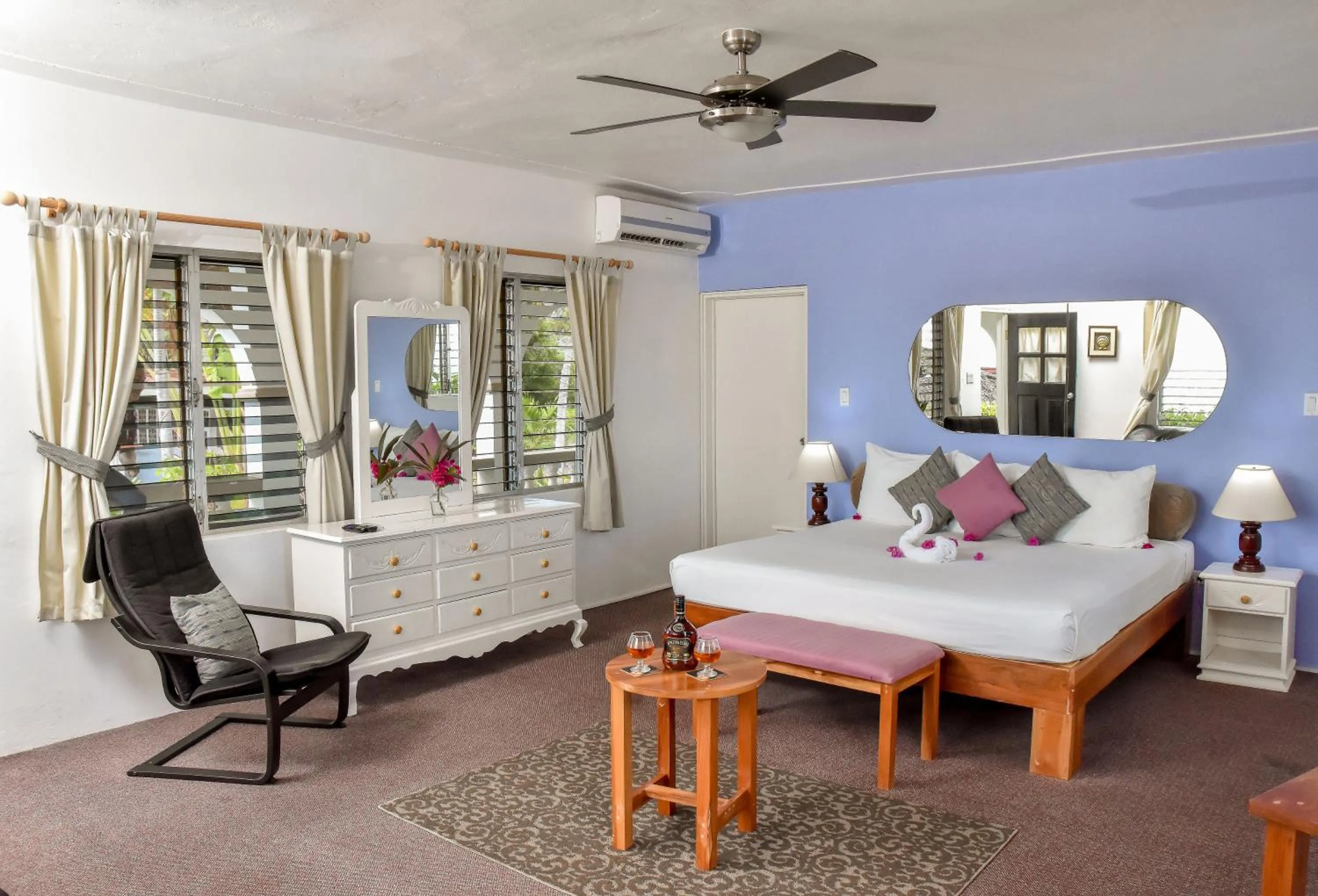 Bed in Beyond Sunset Resort & Villas