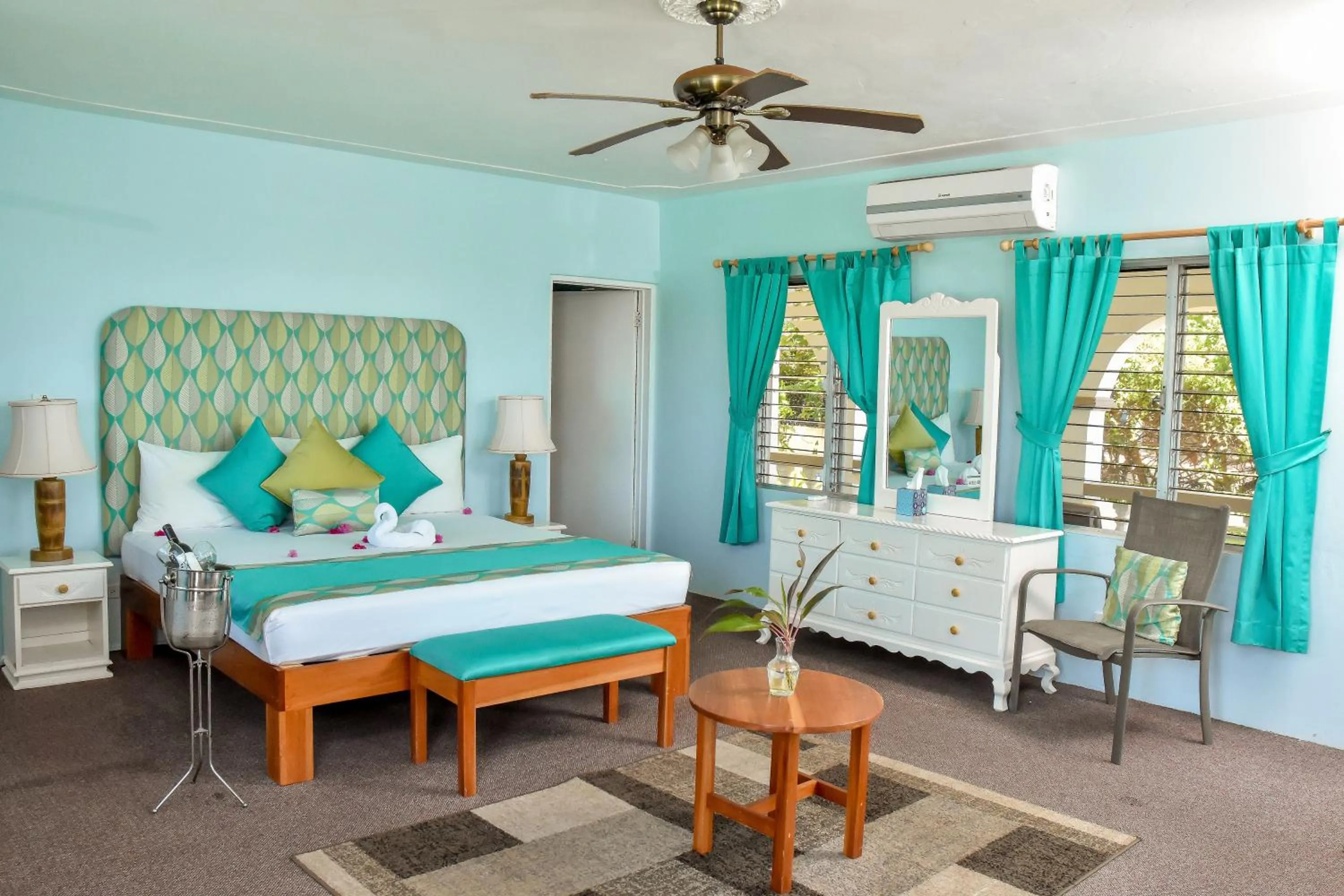 Bed in Beyond Sunset Resort & Villas