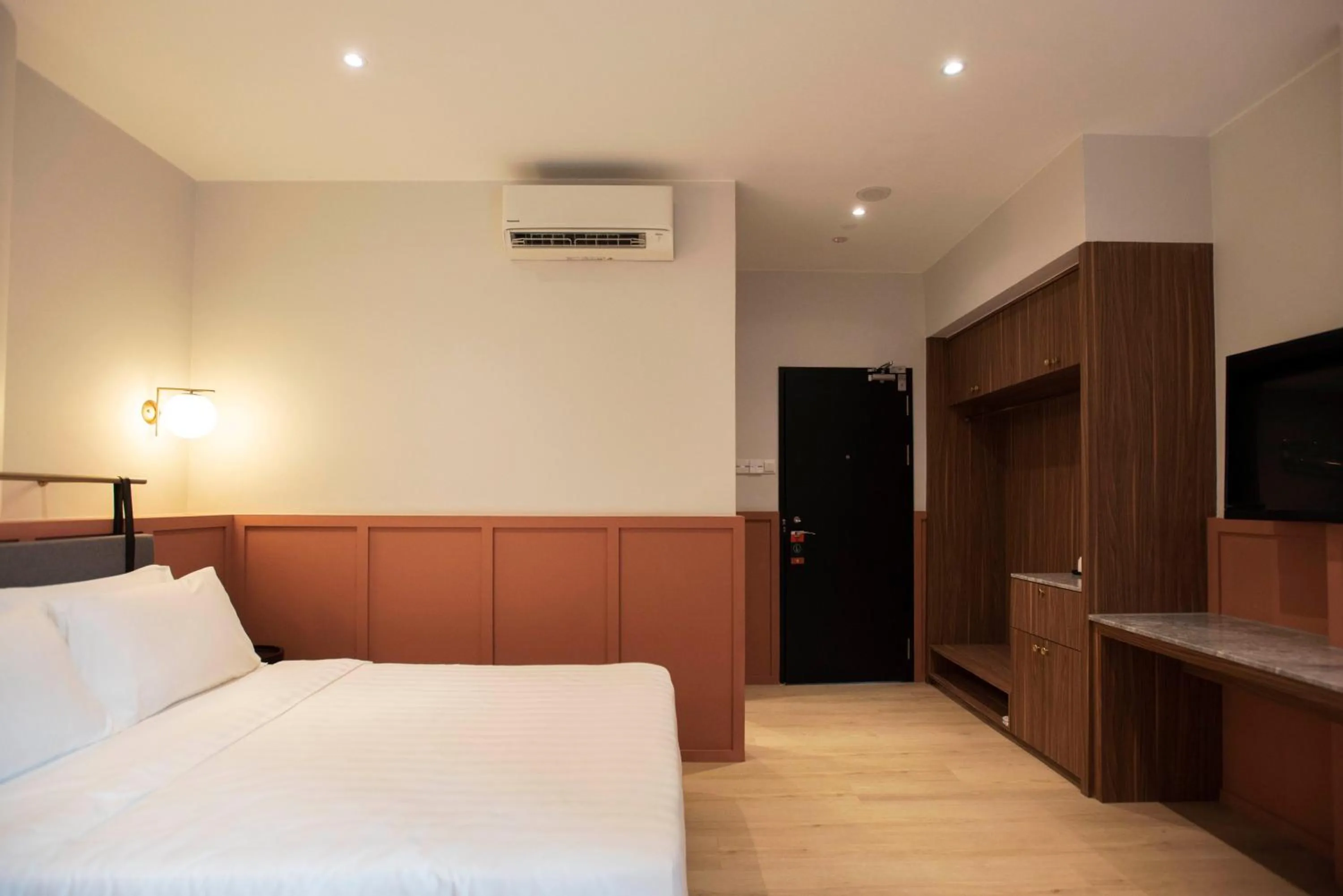 Bed in Monocolo Boutique Hotel