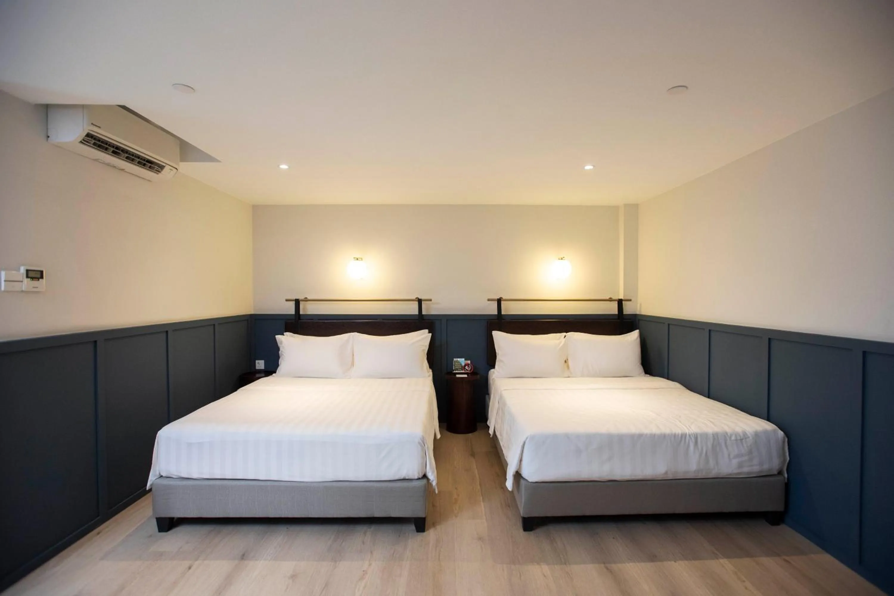 Bed in Monocolo Boutique Hotel