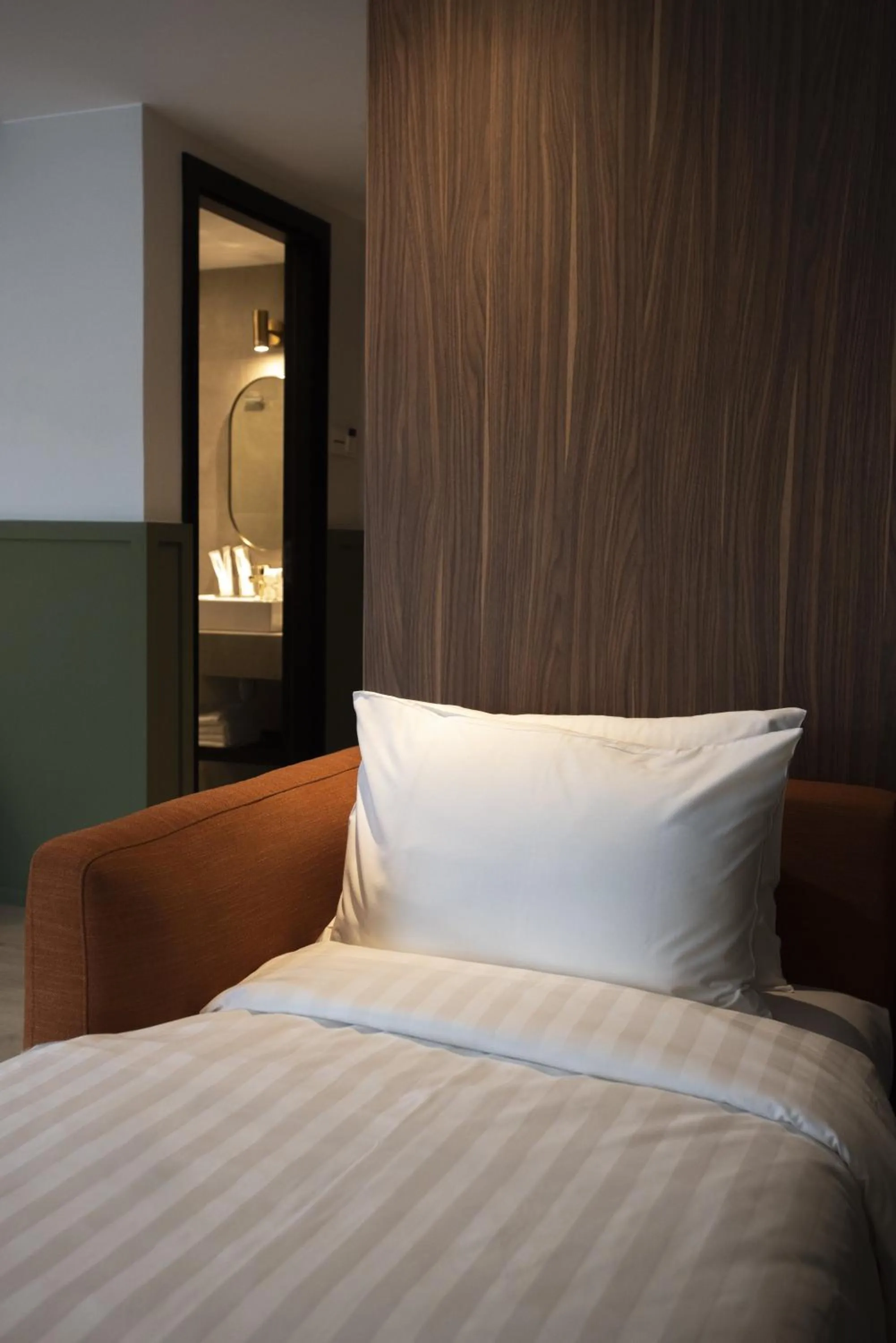 Bed in Monocolo Boutique Hotel