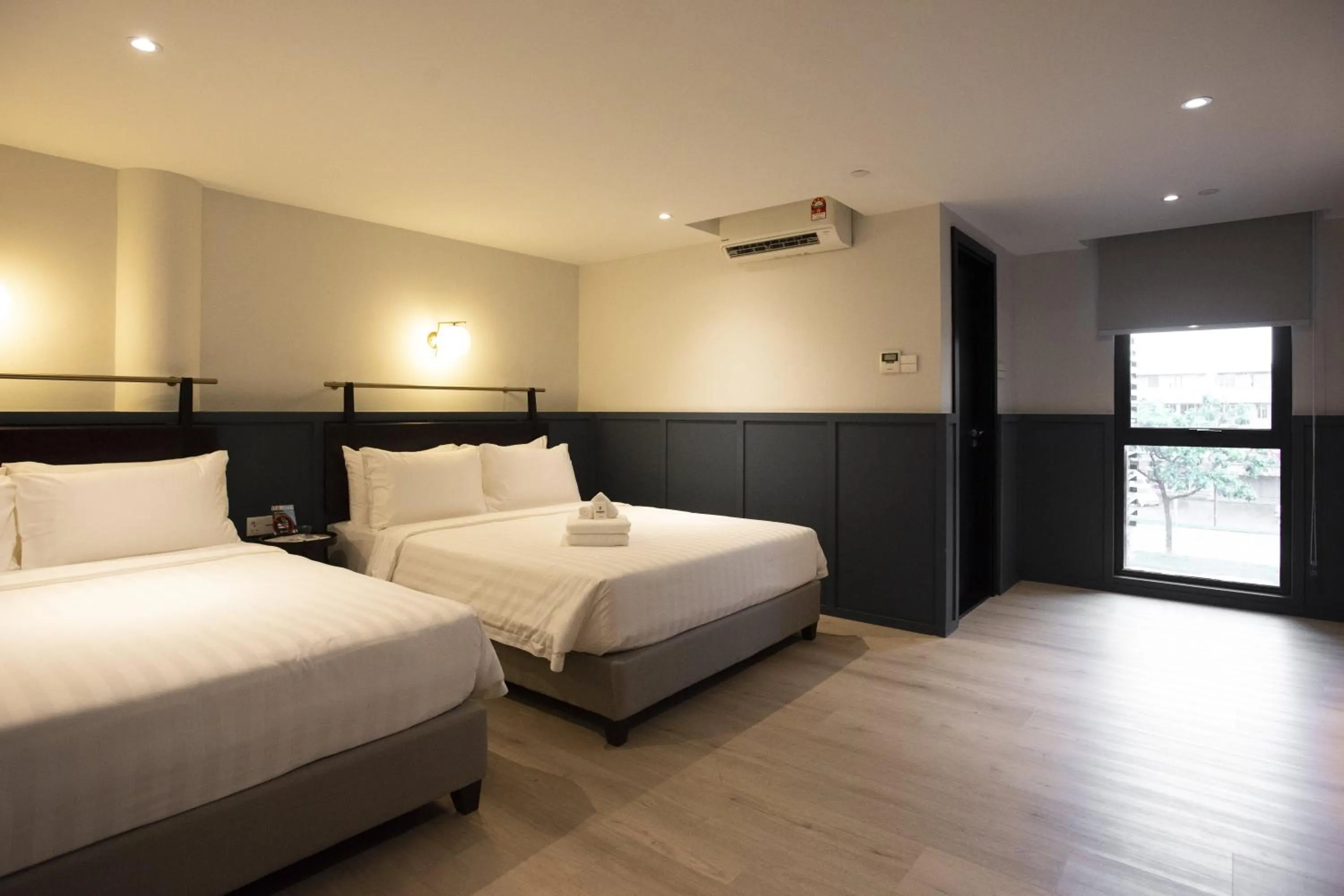 Bed in Monocolo Boutique Hotel