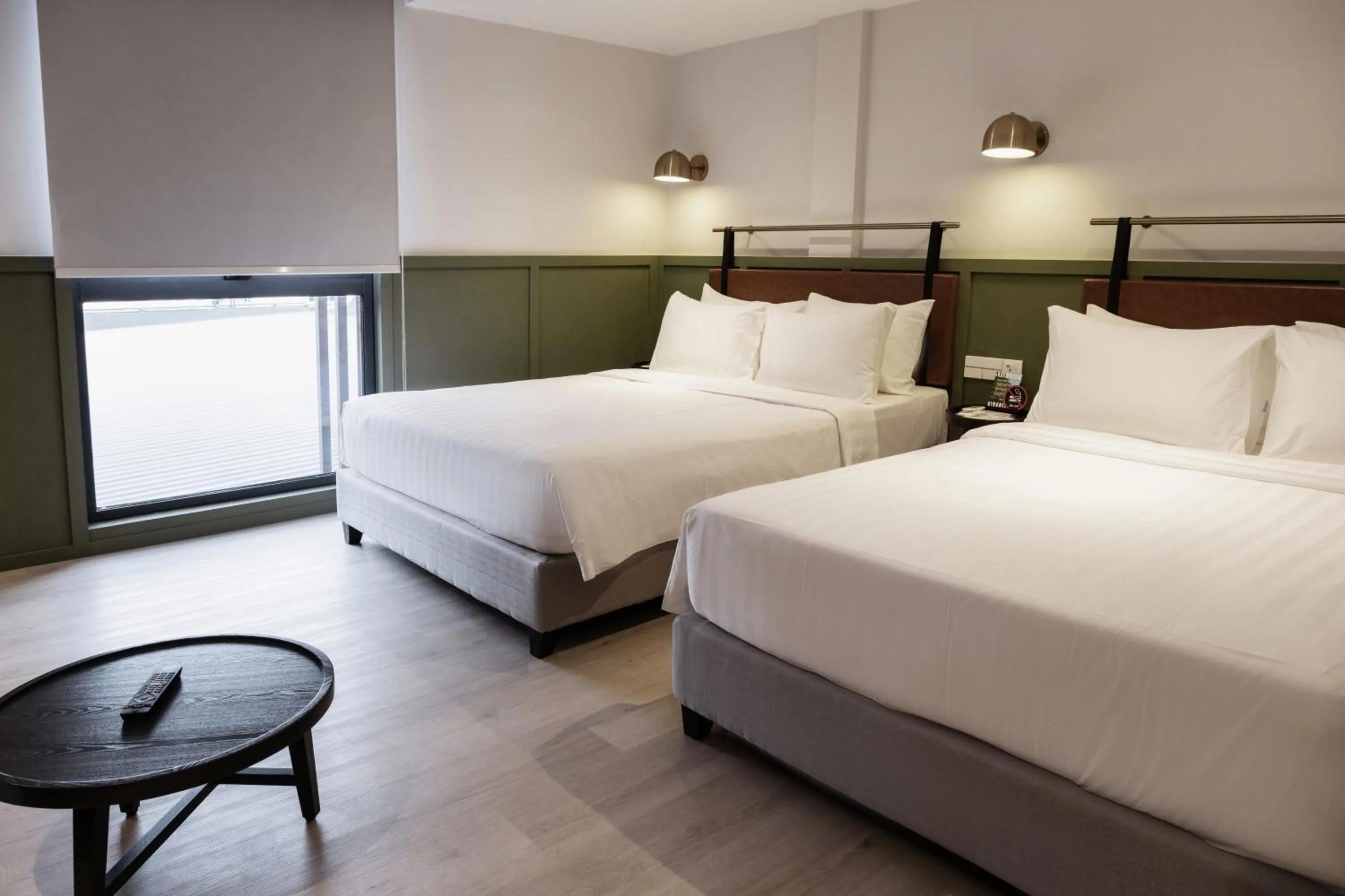 Bed in Monocolo Boutique Hotel