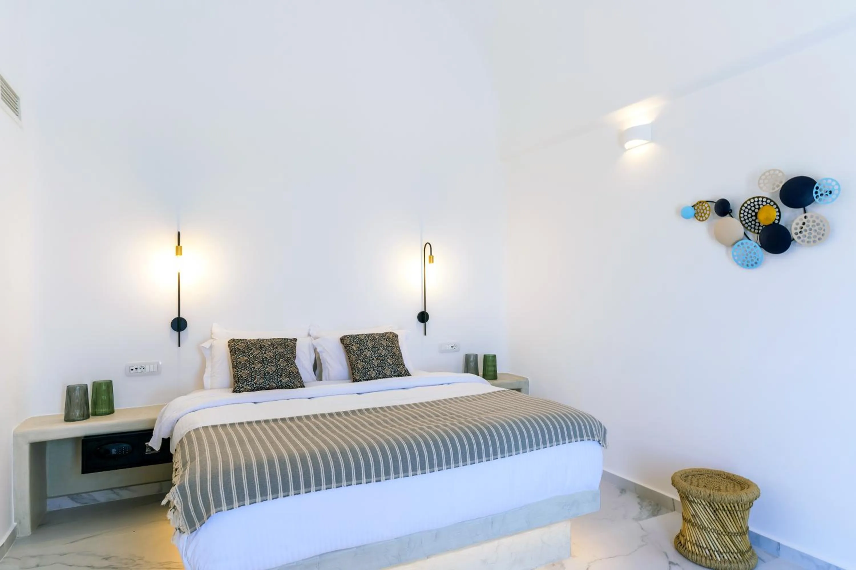 Bed in Lavadoze Luxury Suites