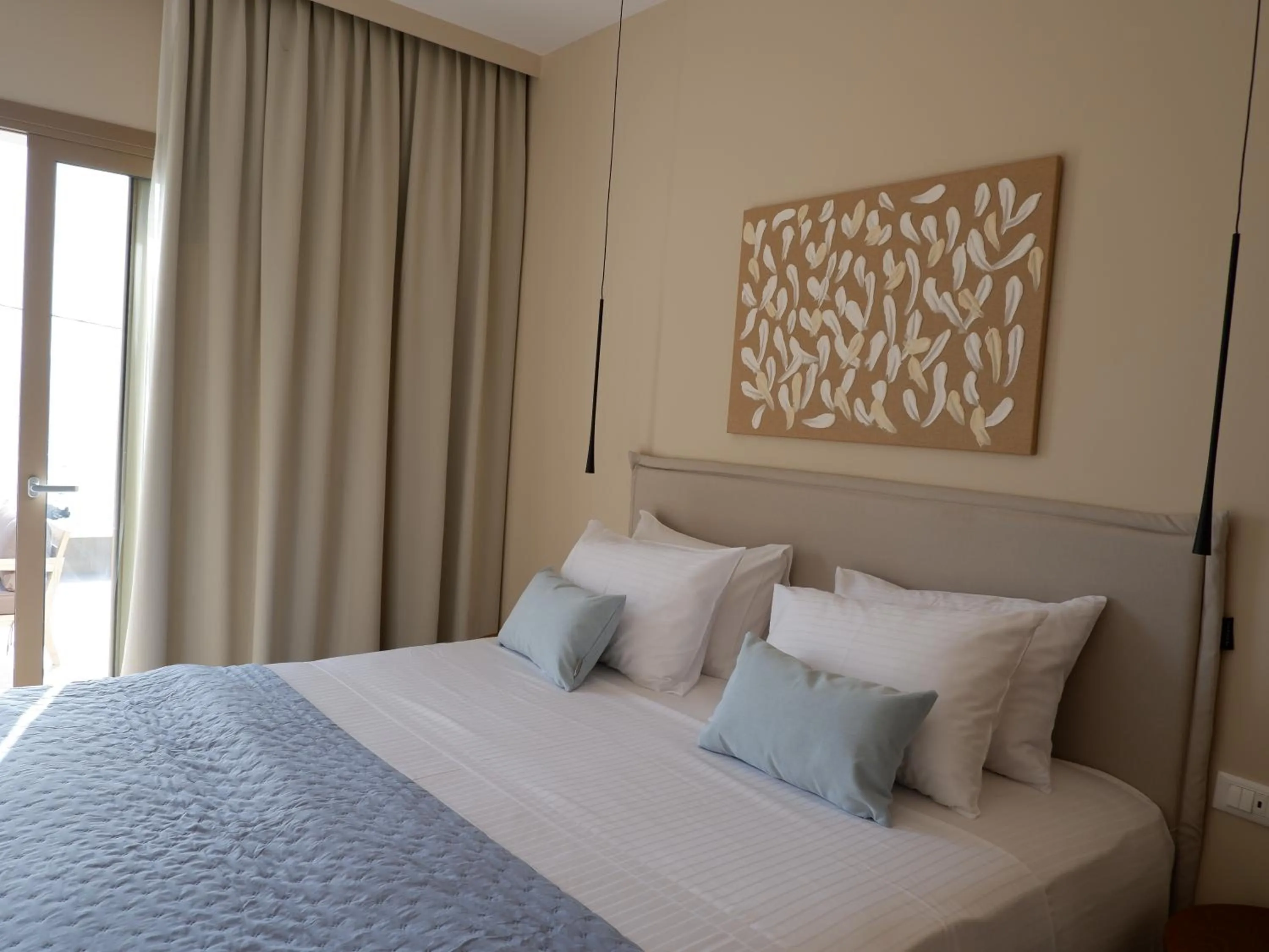 Bed in Kaiser Luxury Suites