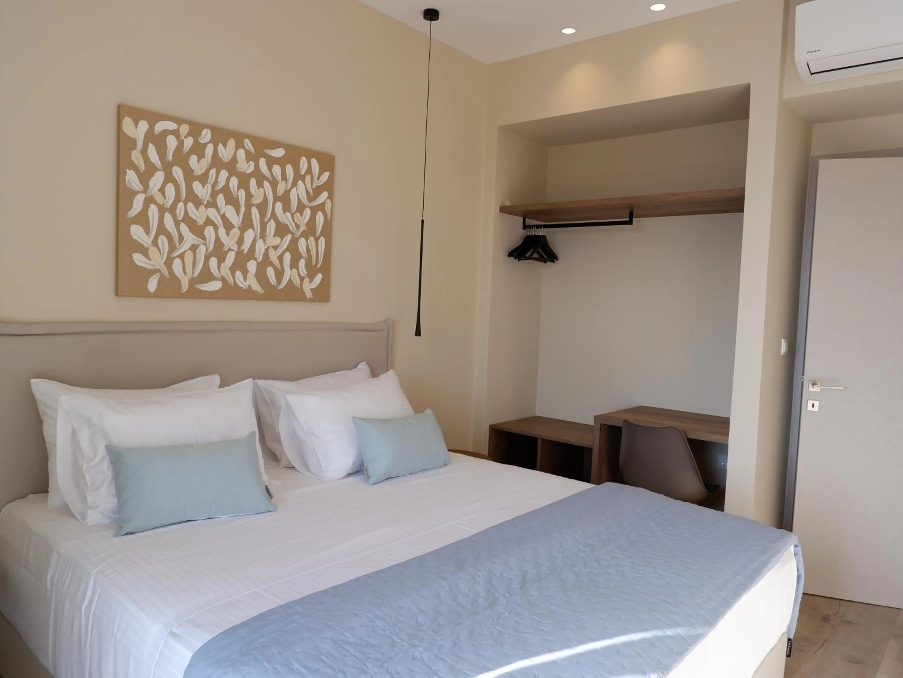 Bed in Kaiser Luxury Suites