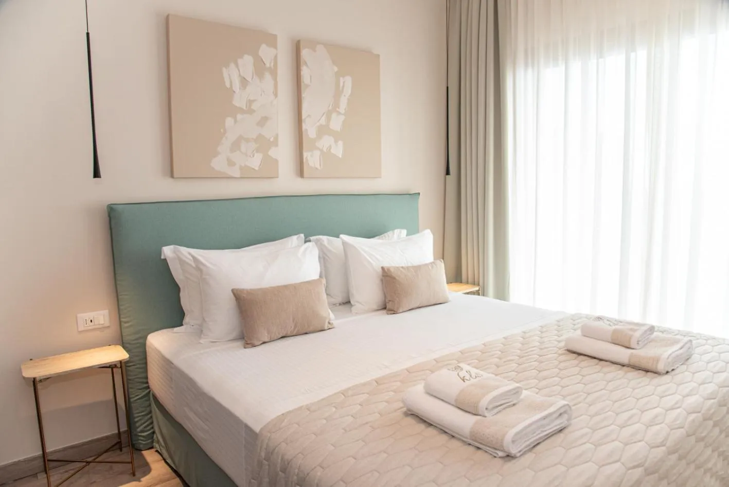 Bed in Kaiser Luxury Suites