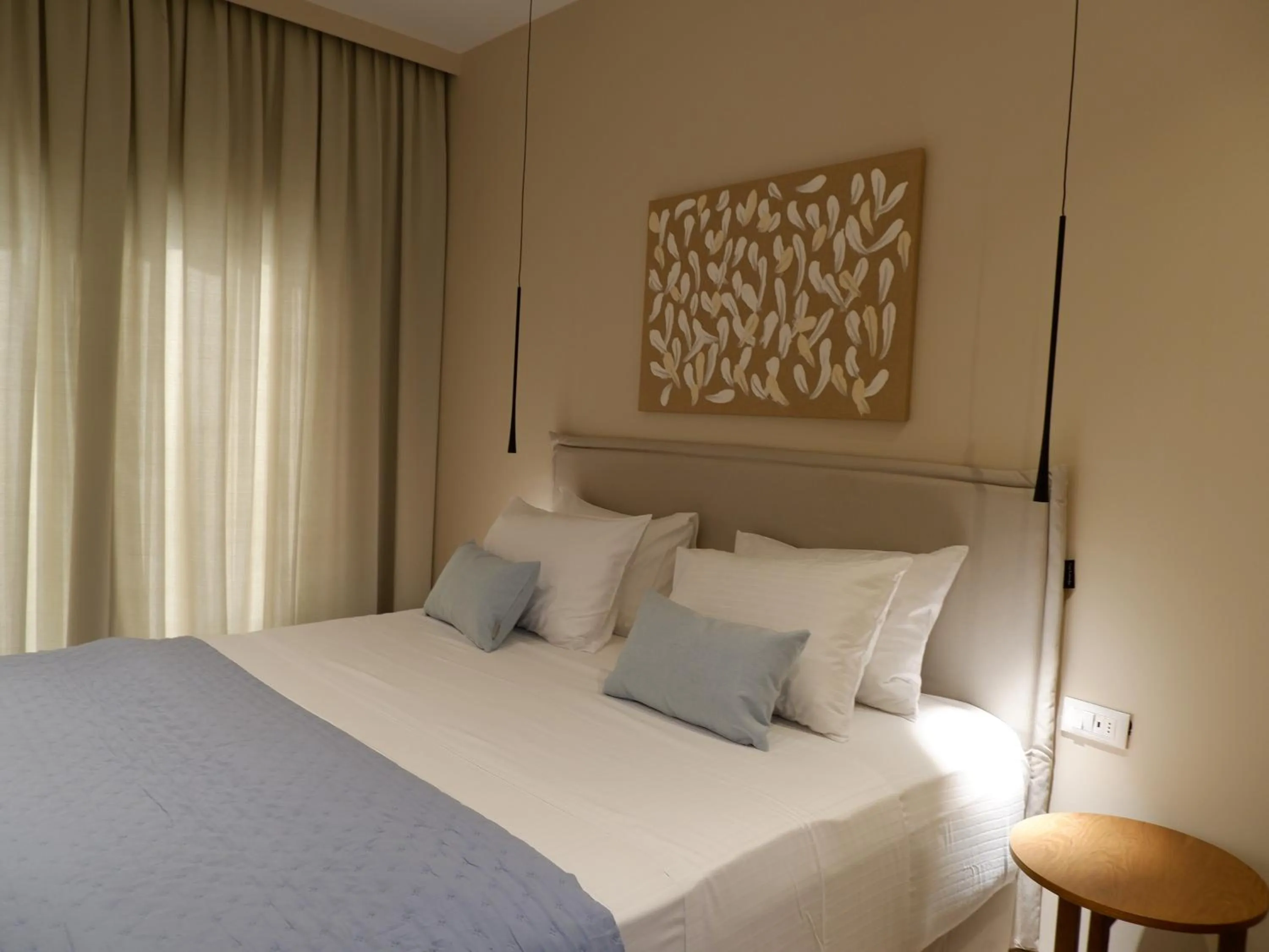 Bed in Kaiser Luxury Suites