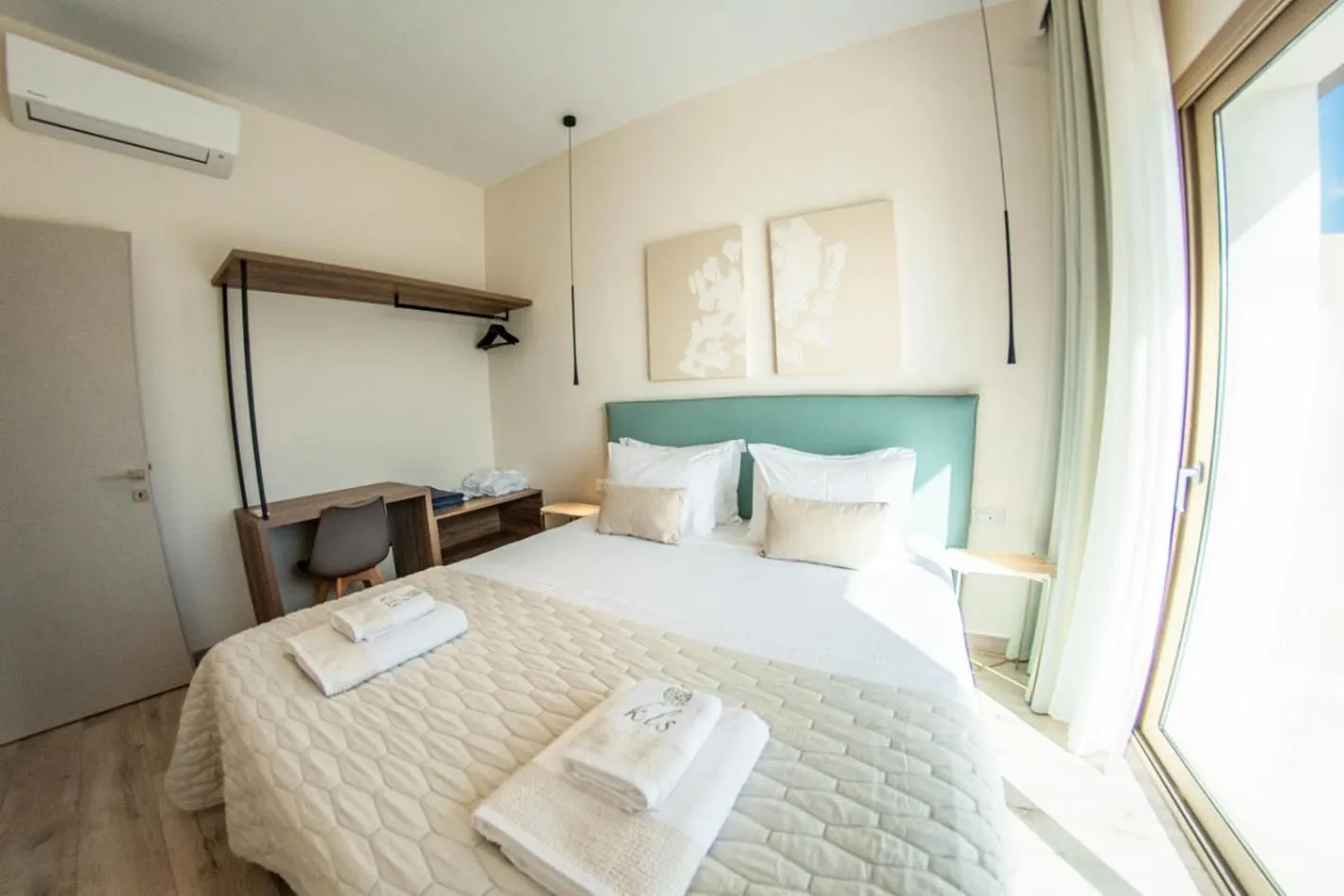 Bed in Kaiser Luxury Suites