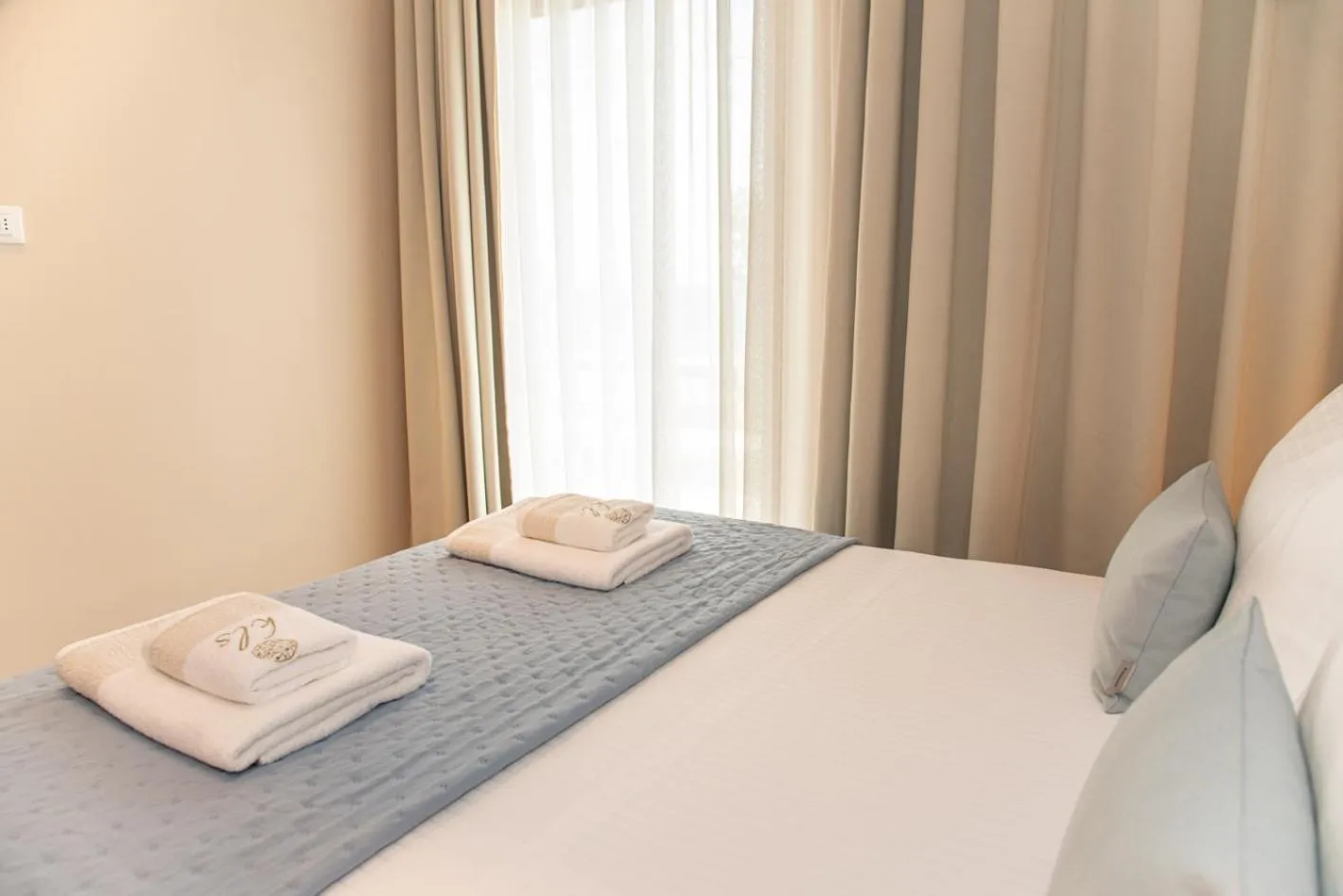 Bed in Kaiser Luxury Suites