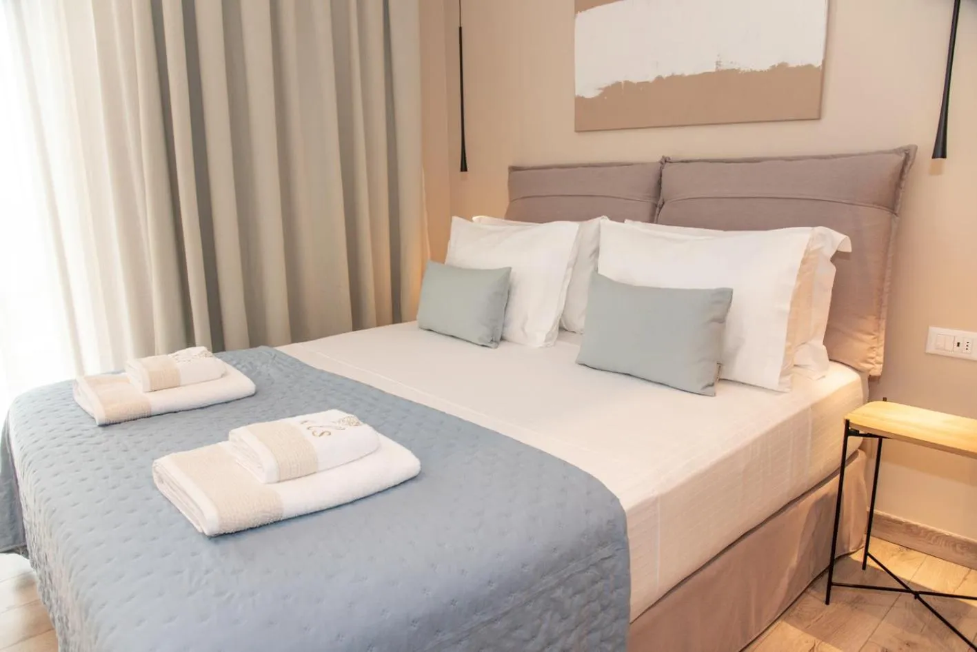 Bed in Kaiser Luxury Suites