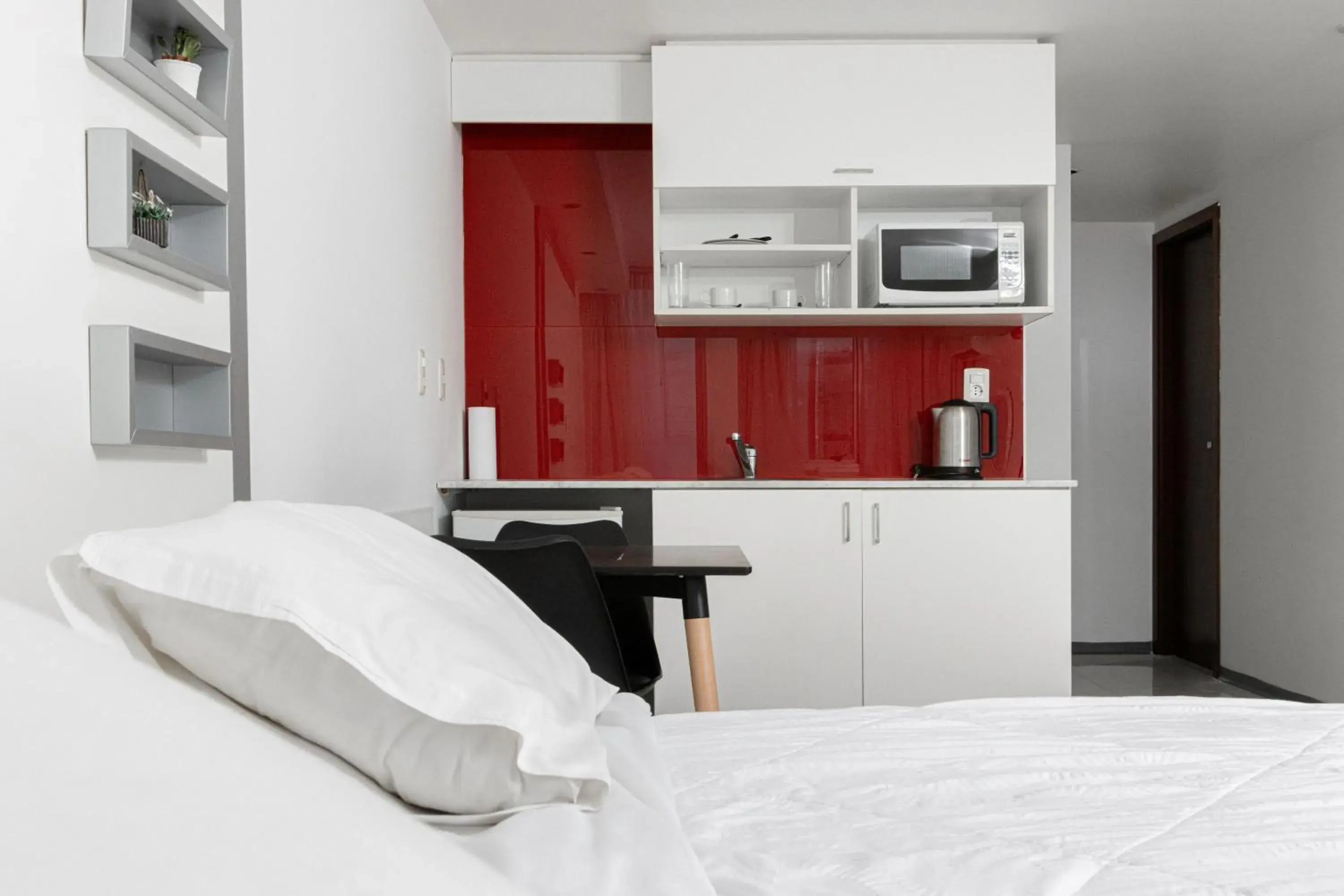 Kitchen or kitchenette, Bed in Hotel Gema Luxury Suites Kitchen or kitchenette, Bed in Hotel Gema Luxury Suites