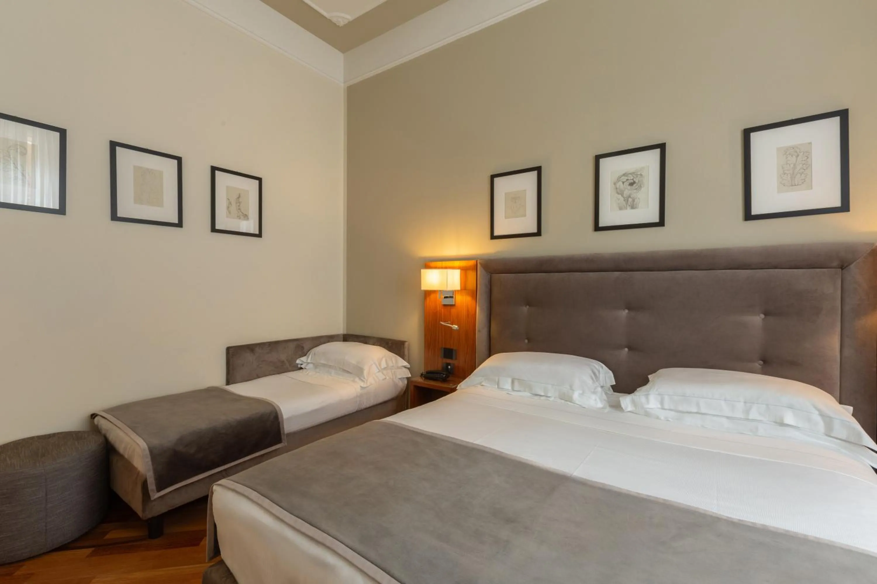 Bed in Hotel Embassy