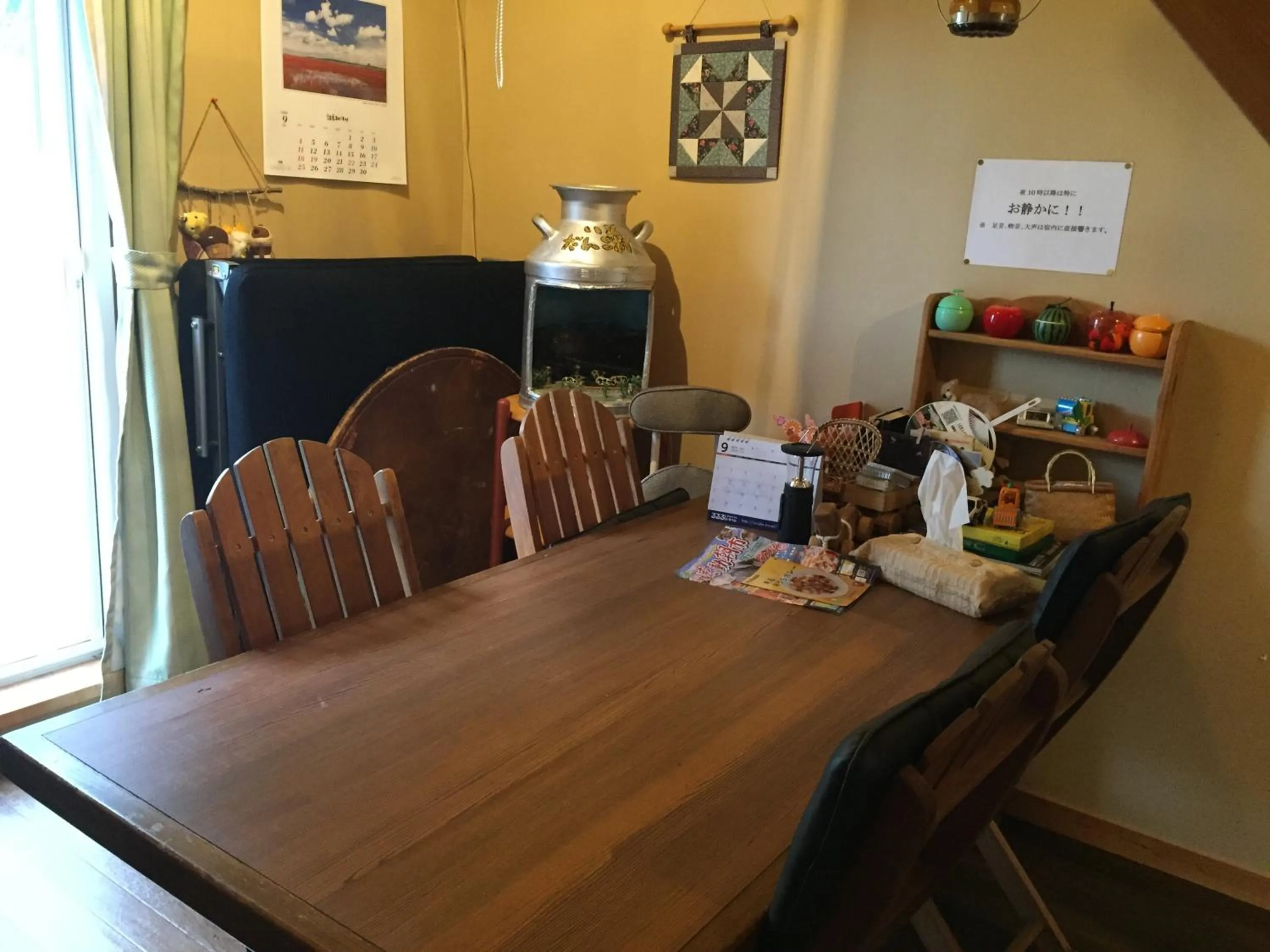 Communal lounge/ TV room in Farm&Inn Imodango Mura