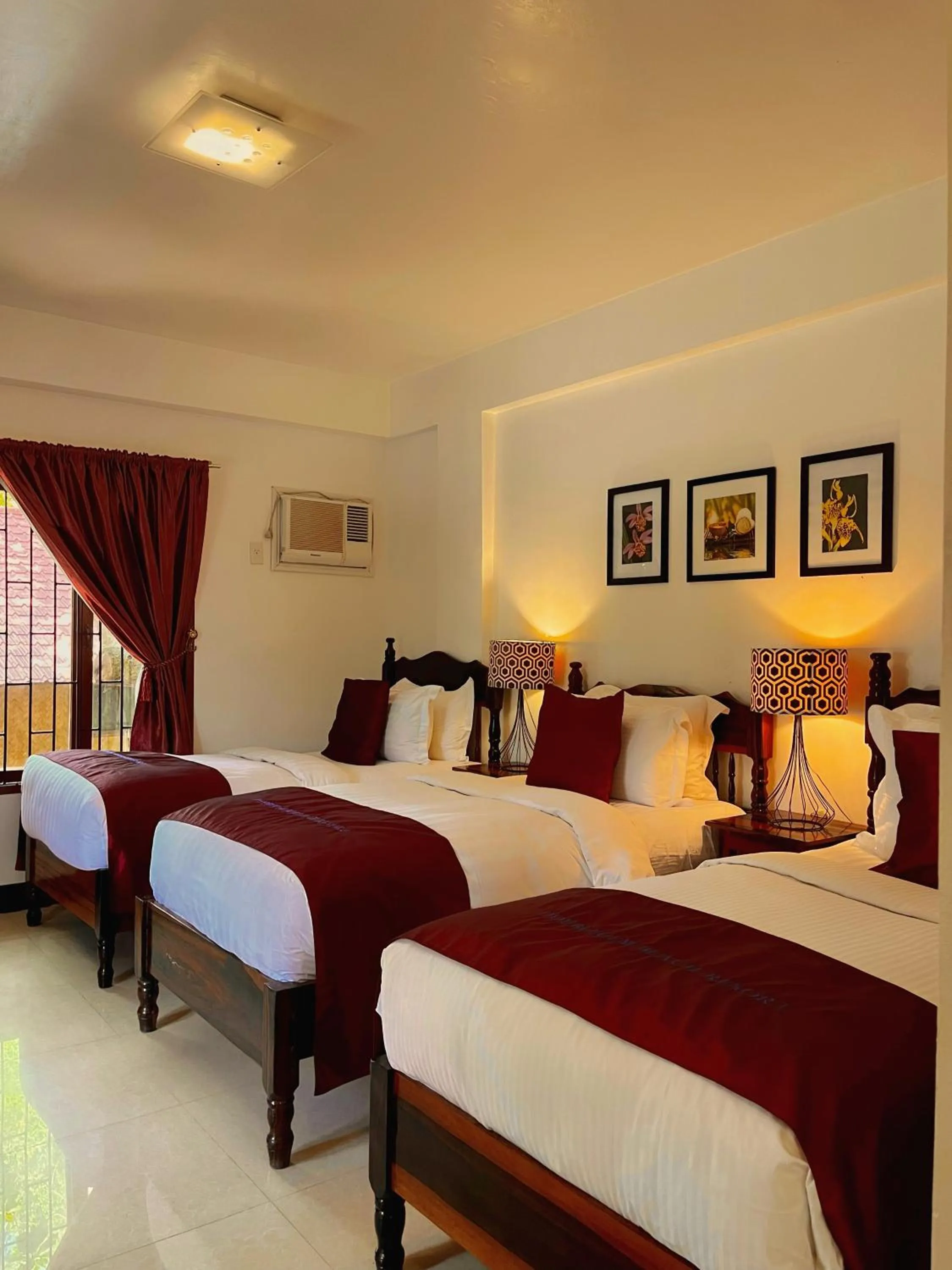 Bed in Doublegem Beach Resort and Hotel