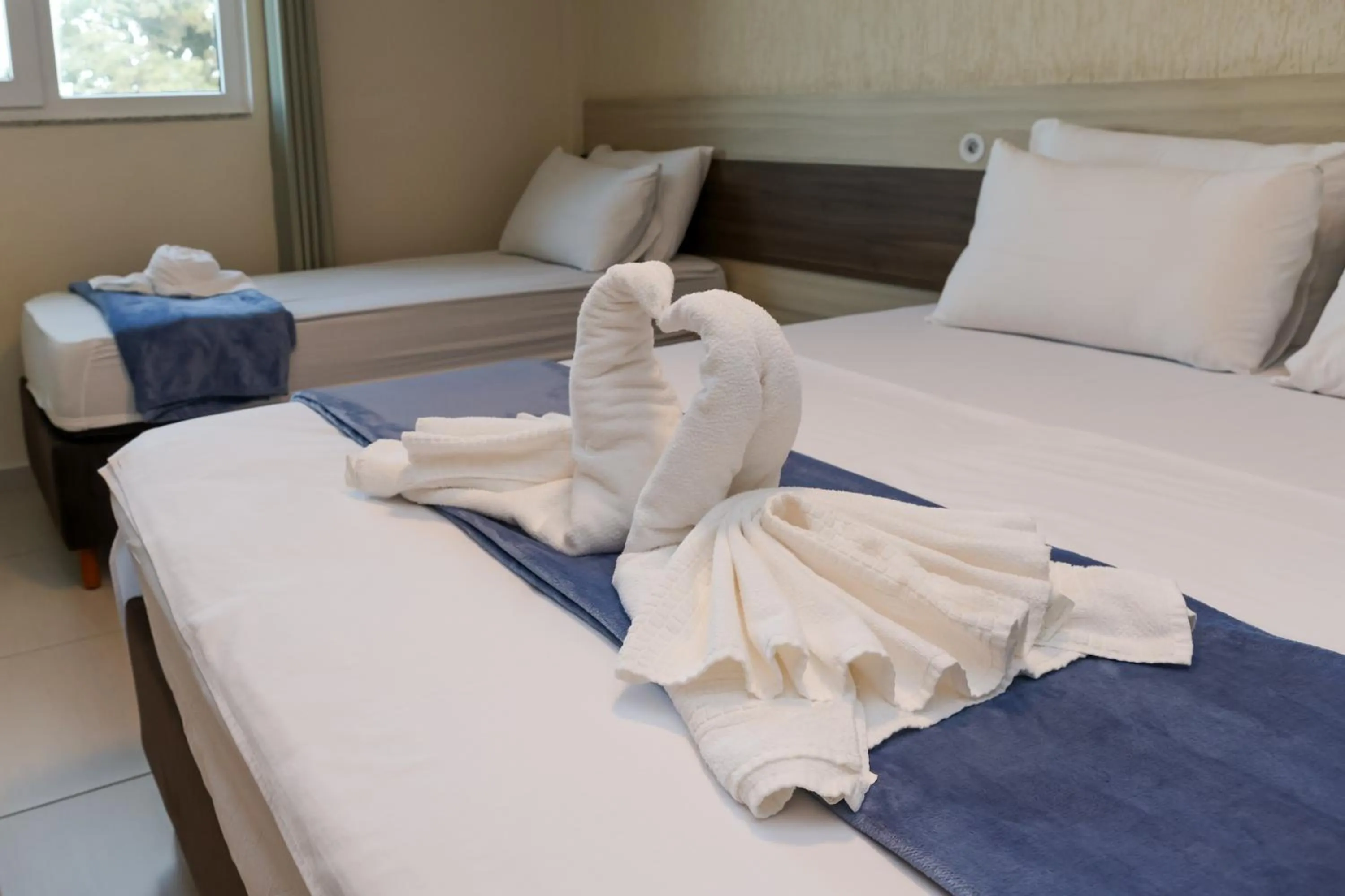 Bed in Pousada Roberto Monteiro - Frente Mar