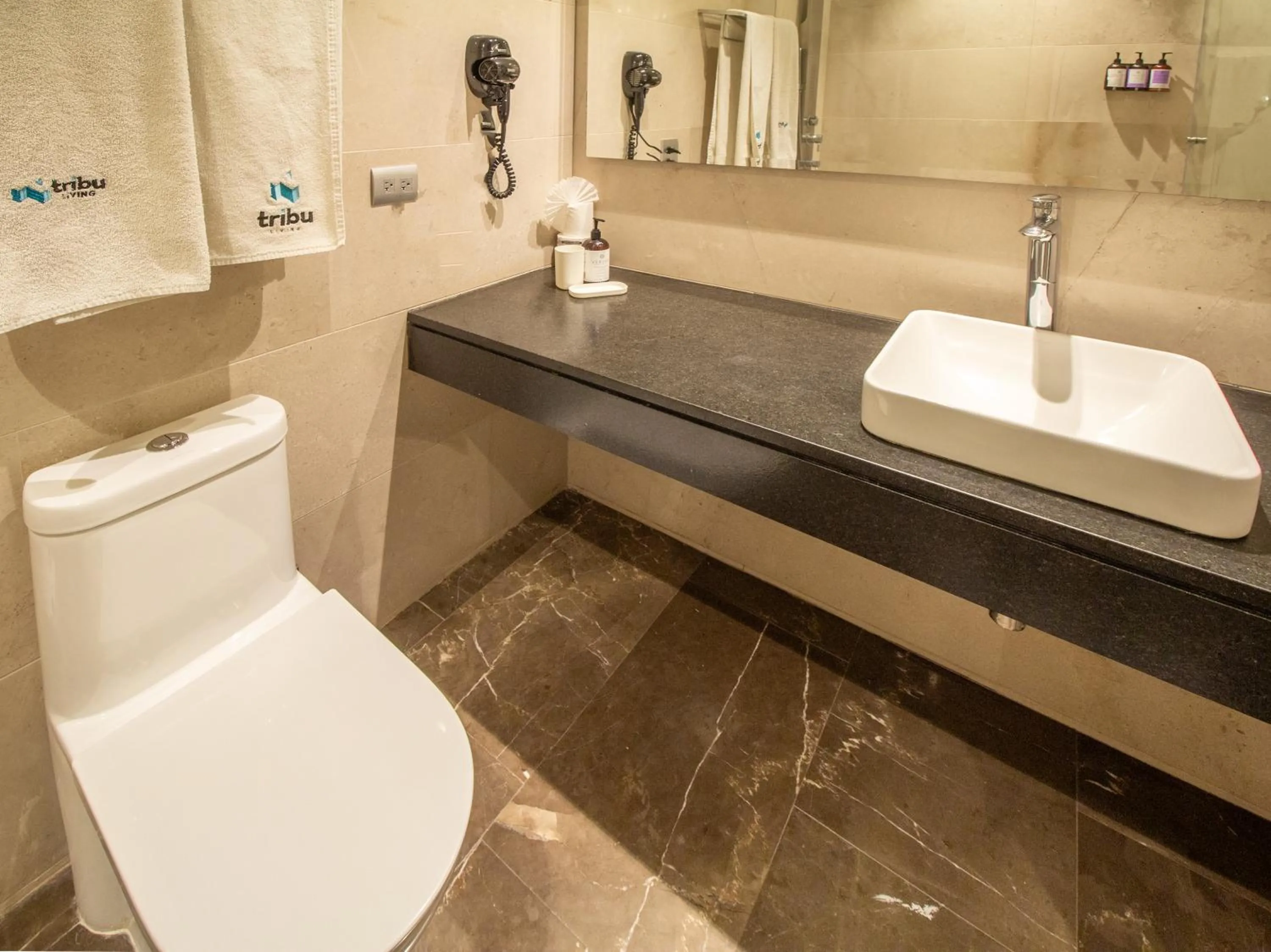 Bathroom in Tribu Sonata with pool