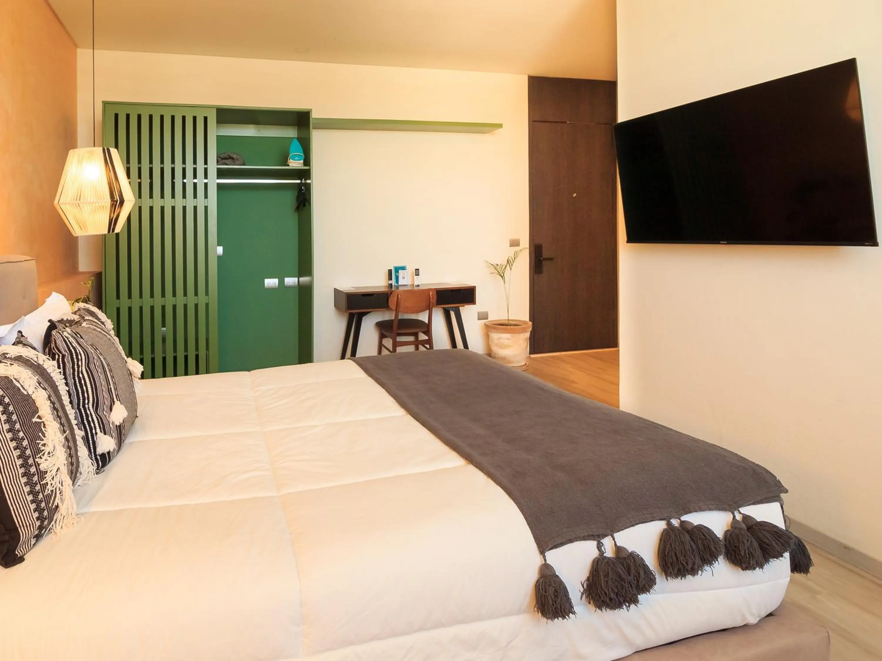 Bed in Tribu Sonata with pool