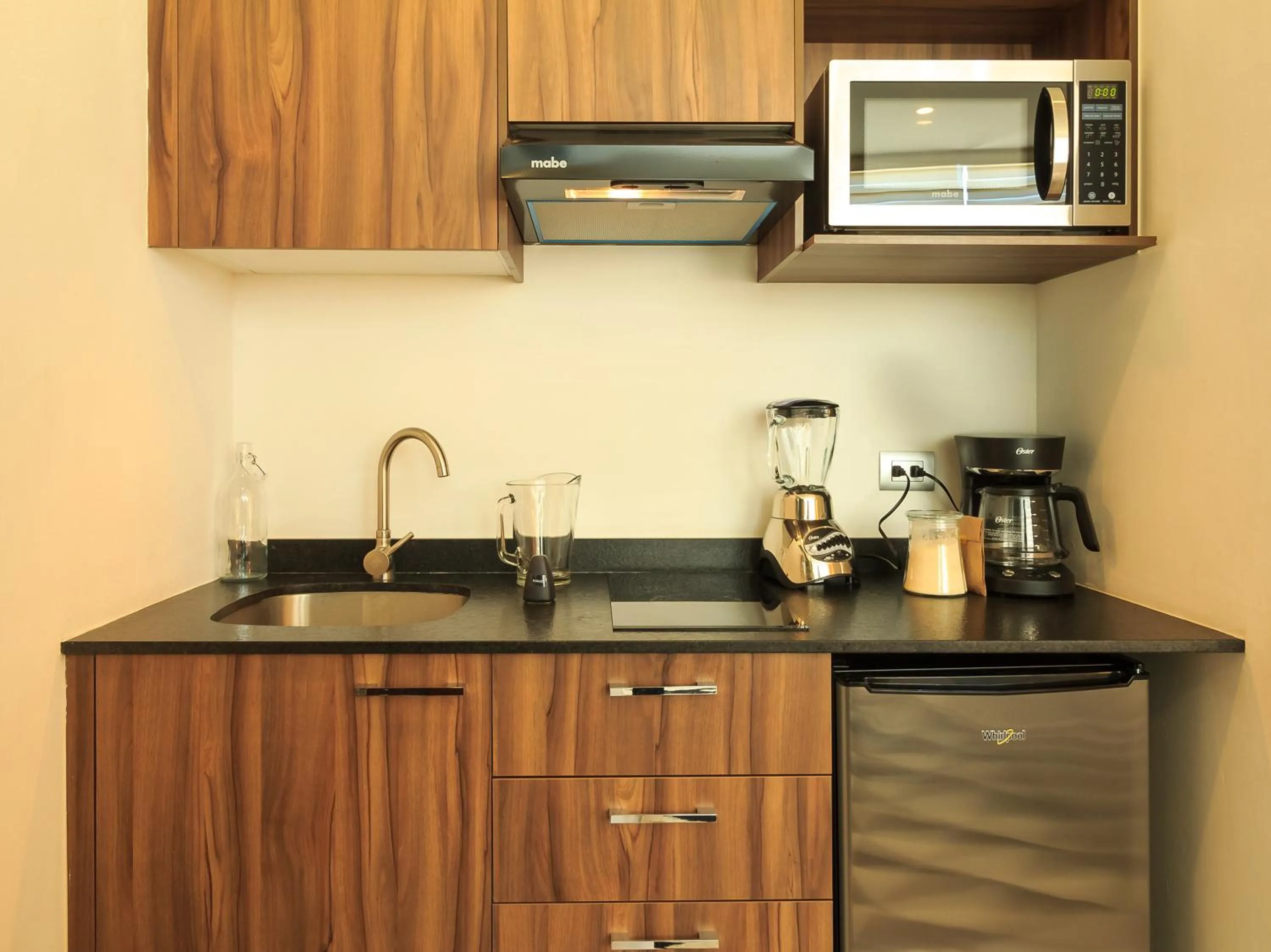 Kitchen or kitchenette in Tribu Sonata with pool