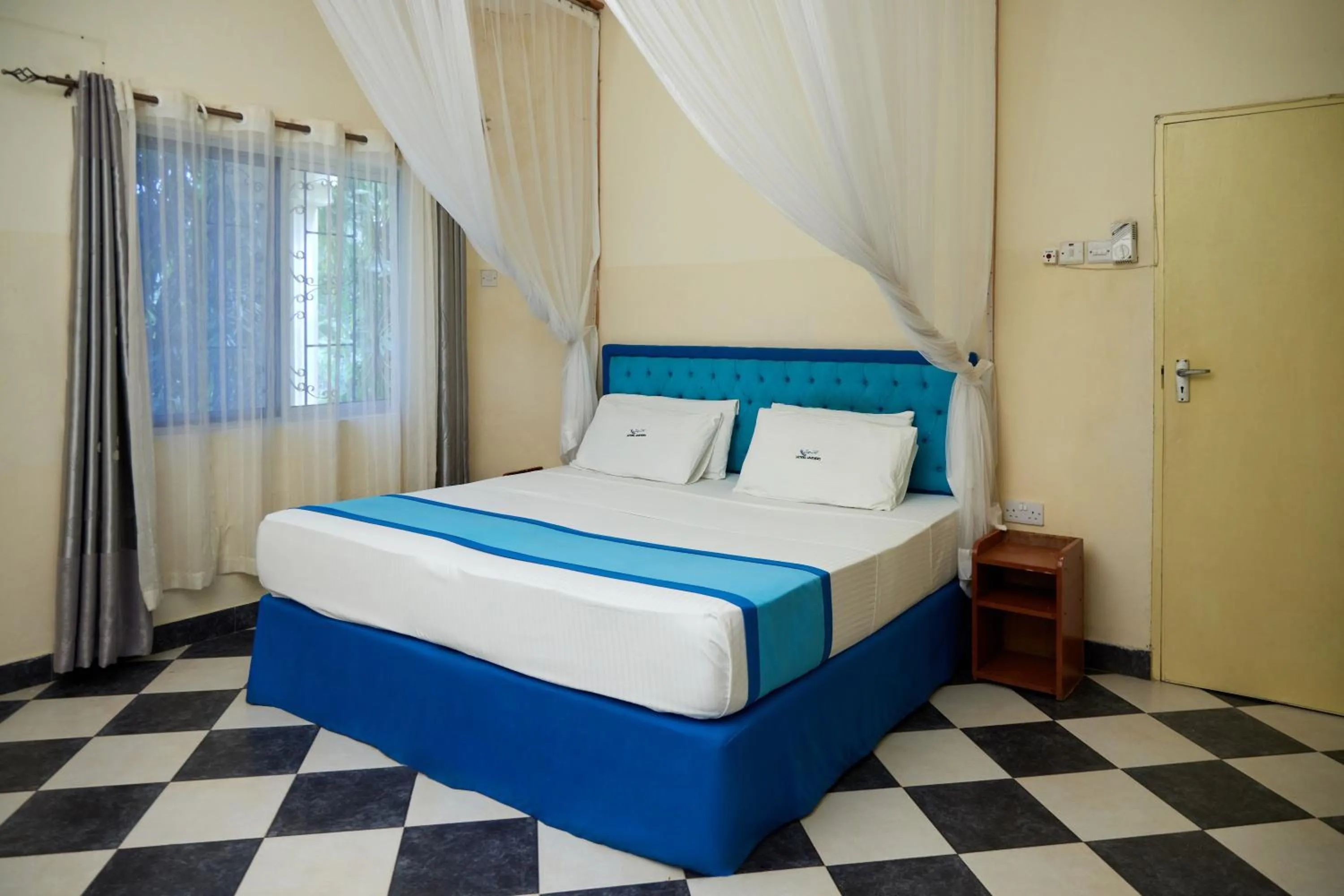 Bedroom, Bed in Jacyjoka Apartments Nyali