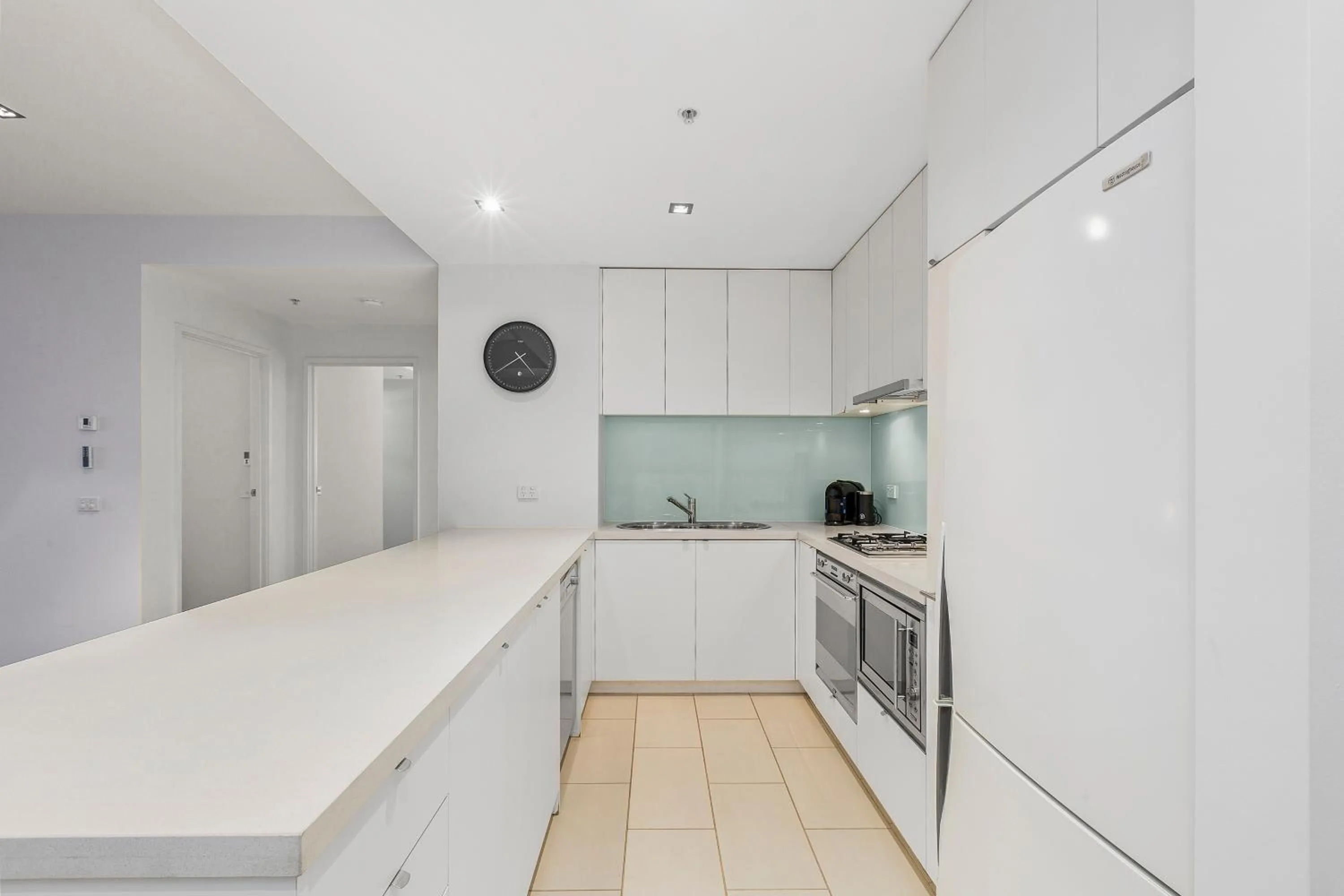 Kitchen or kitchenette in Melbourne Holiday Apartments Flinders Wharf