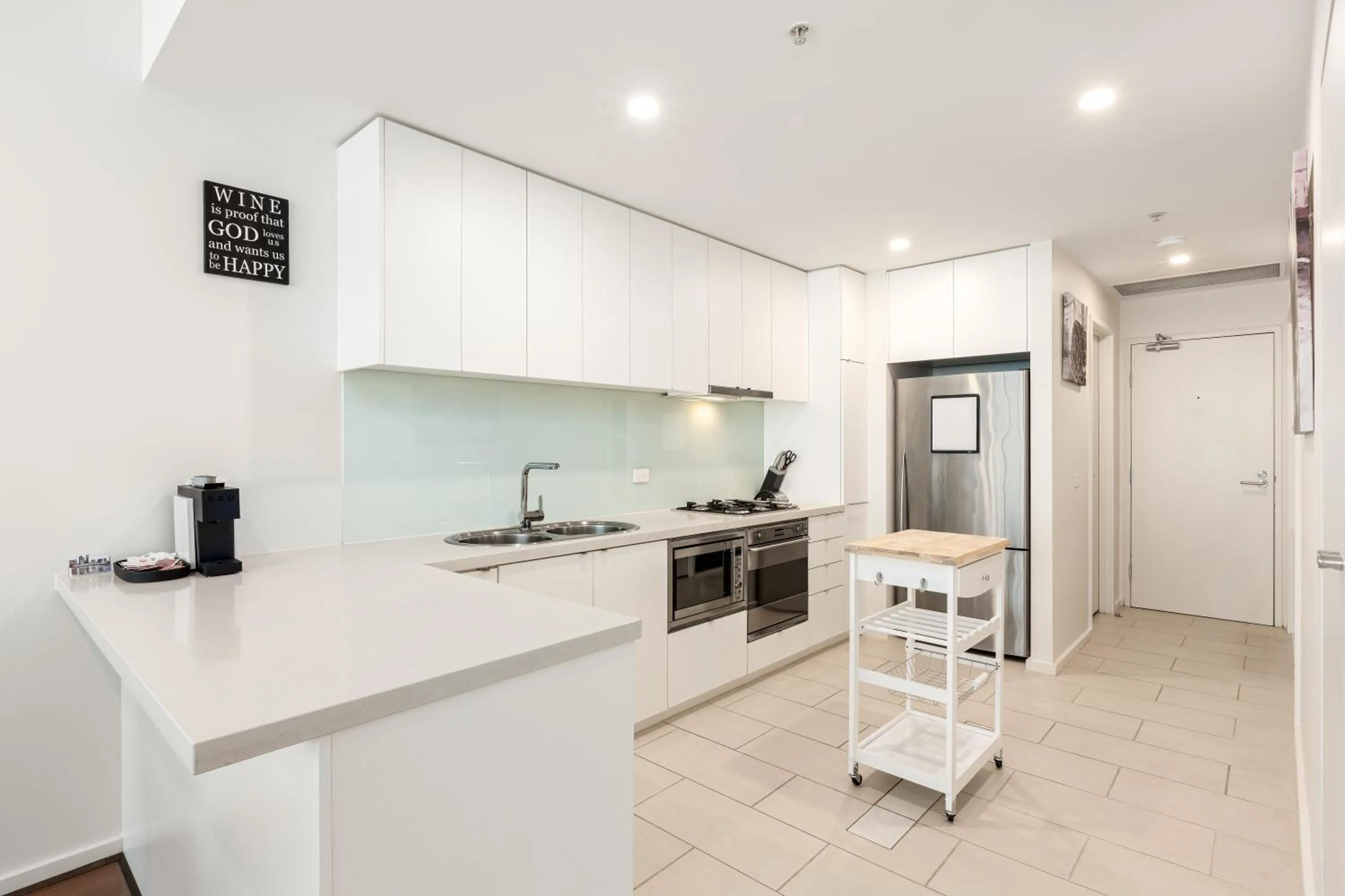 kitchen in Melbourne Holiday Apartments Flinders Wharf