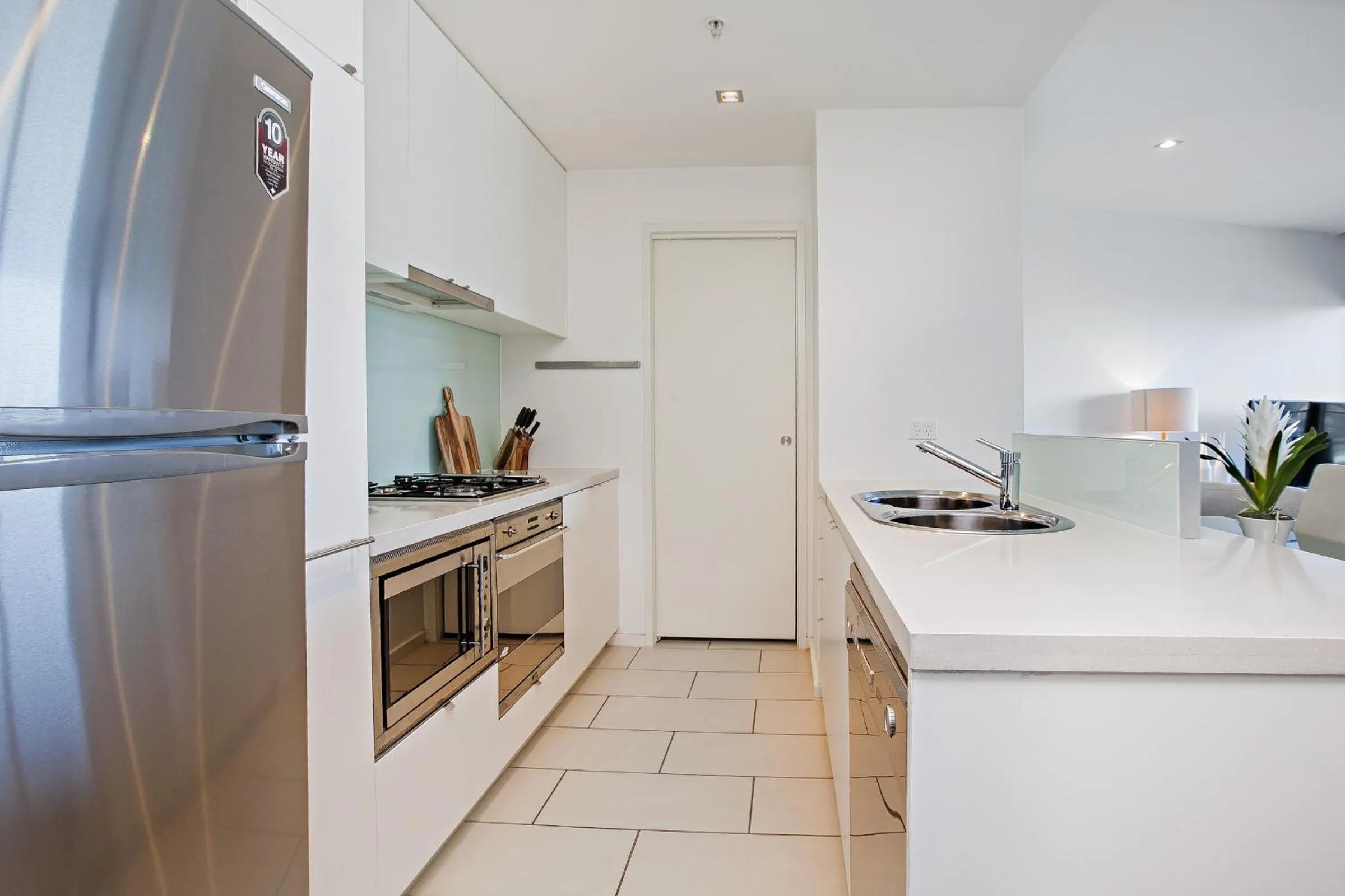 Kitchen or kitchenette in Melbourne Holiday Apartments Flinders Wharf