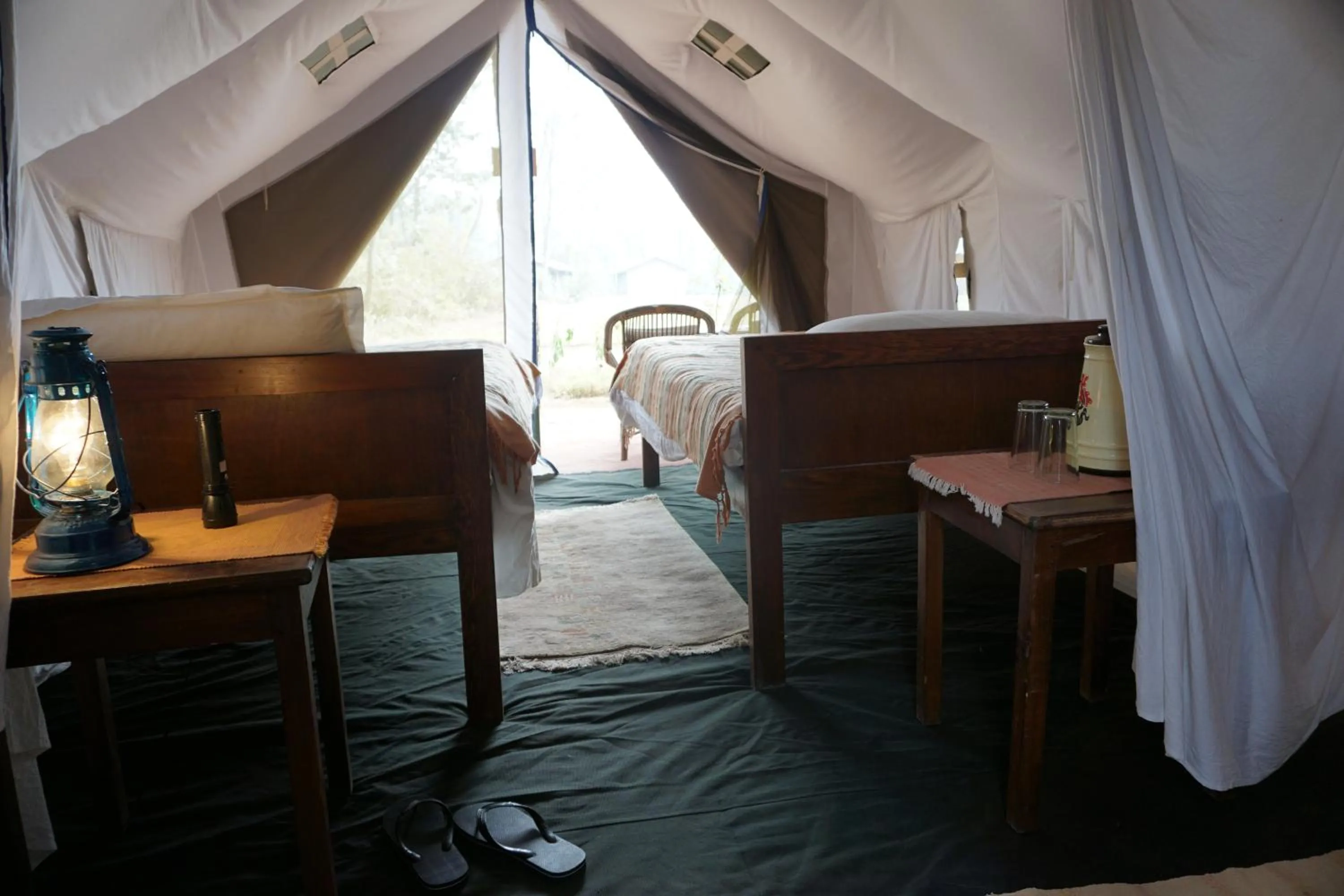 Bed in Tiger Tops Tharu Lodge